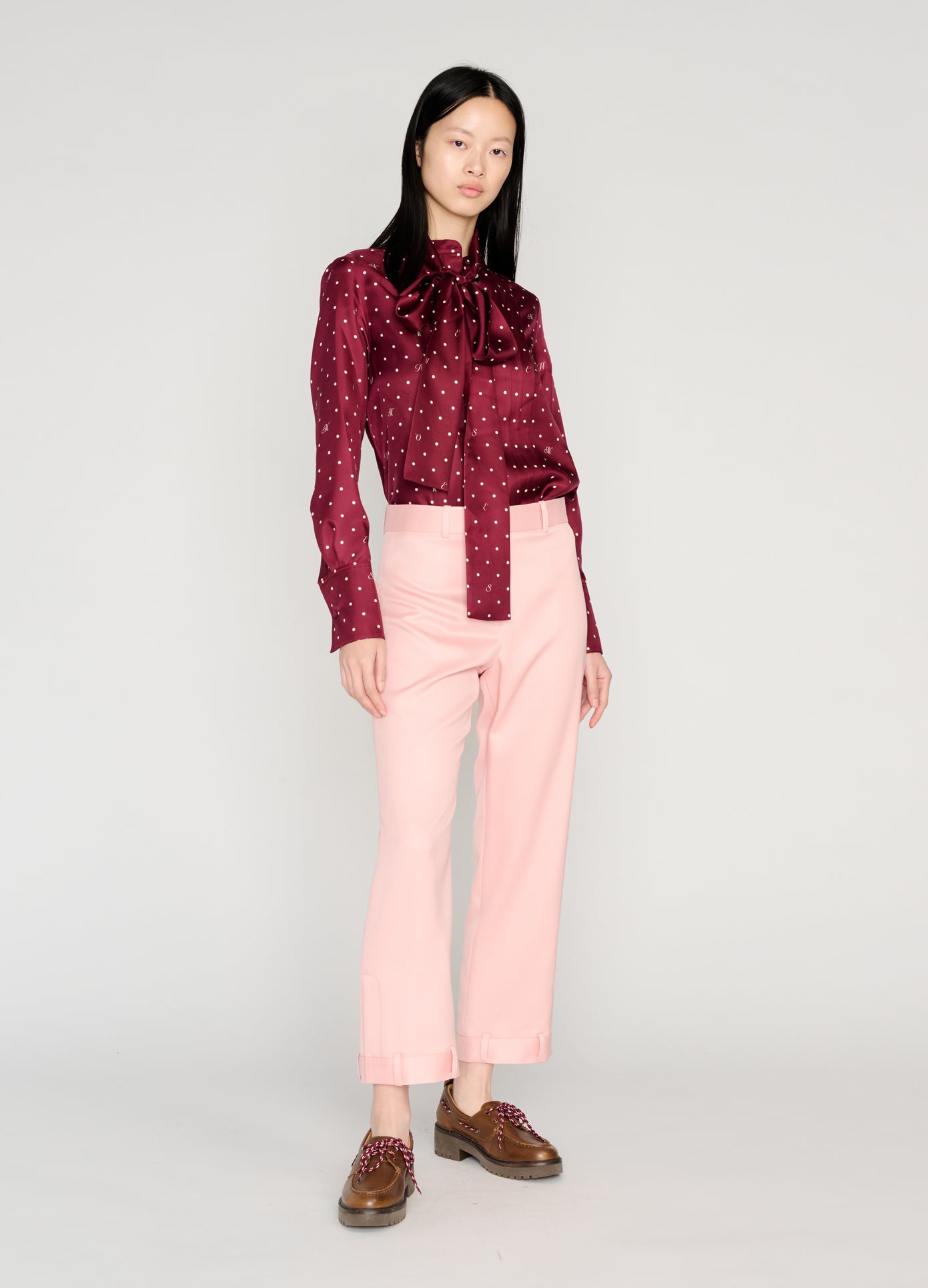 MONSE Tie Neck Cowl Back Blouse in burgundy on model style full front view