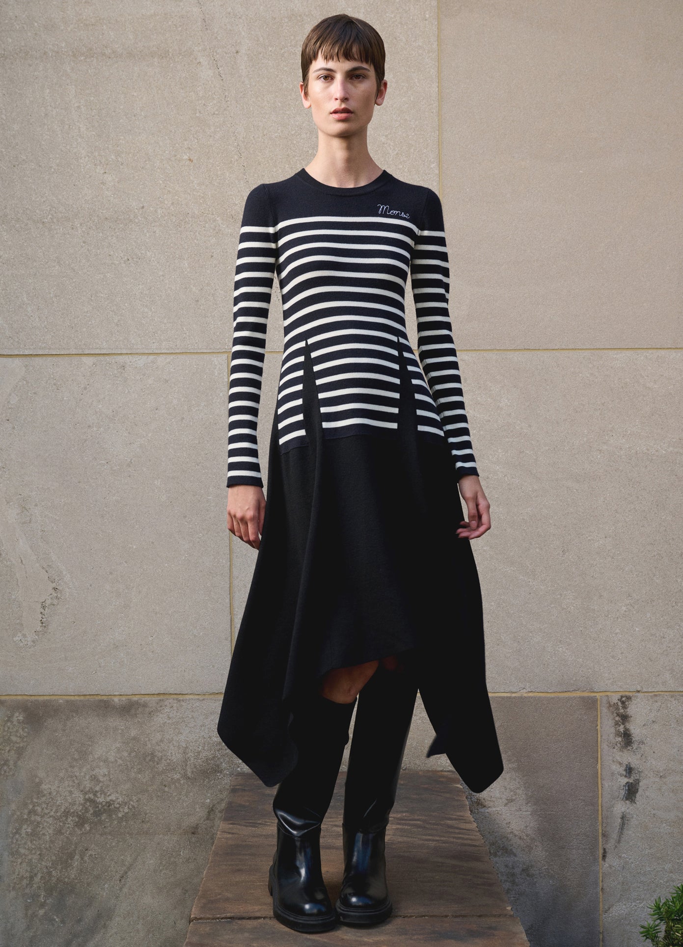 MONSE Trompe L'oeil Dart Knitted Dress in Navy on model editorial image