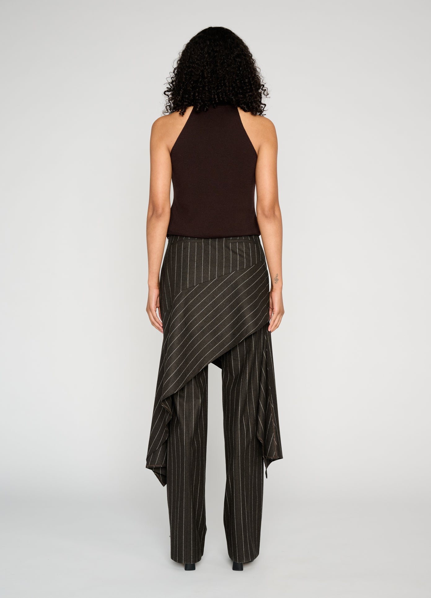 MONSE Twist Front Roll Neck Knit Top in brown on model full back view