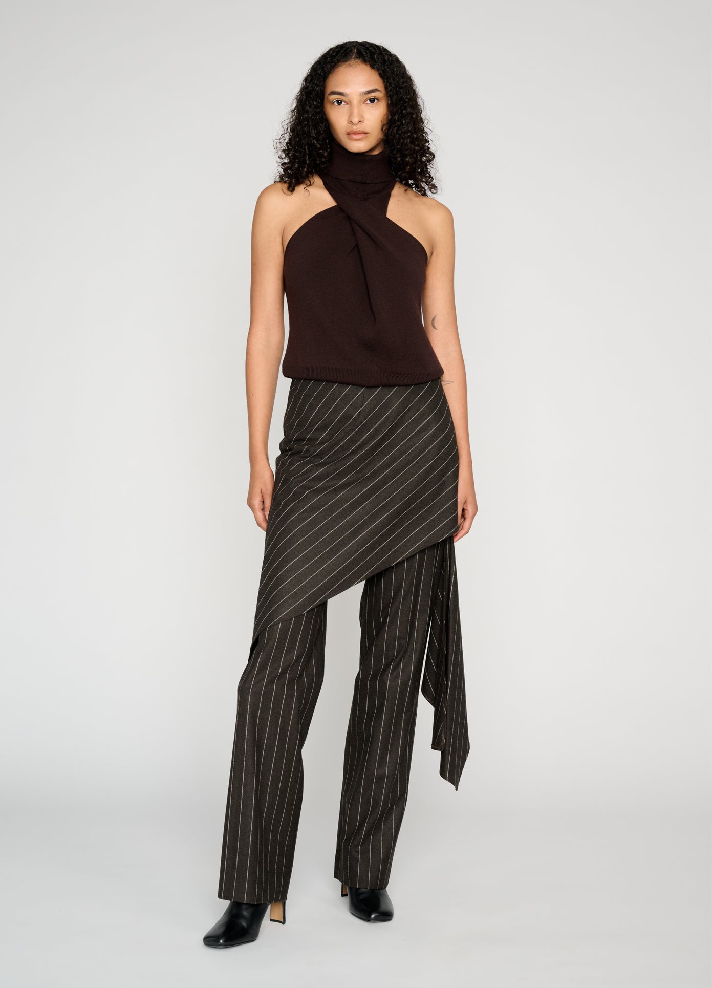 MONSE Twist Front Roll Neck Knit Top in brown on model style full front view