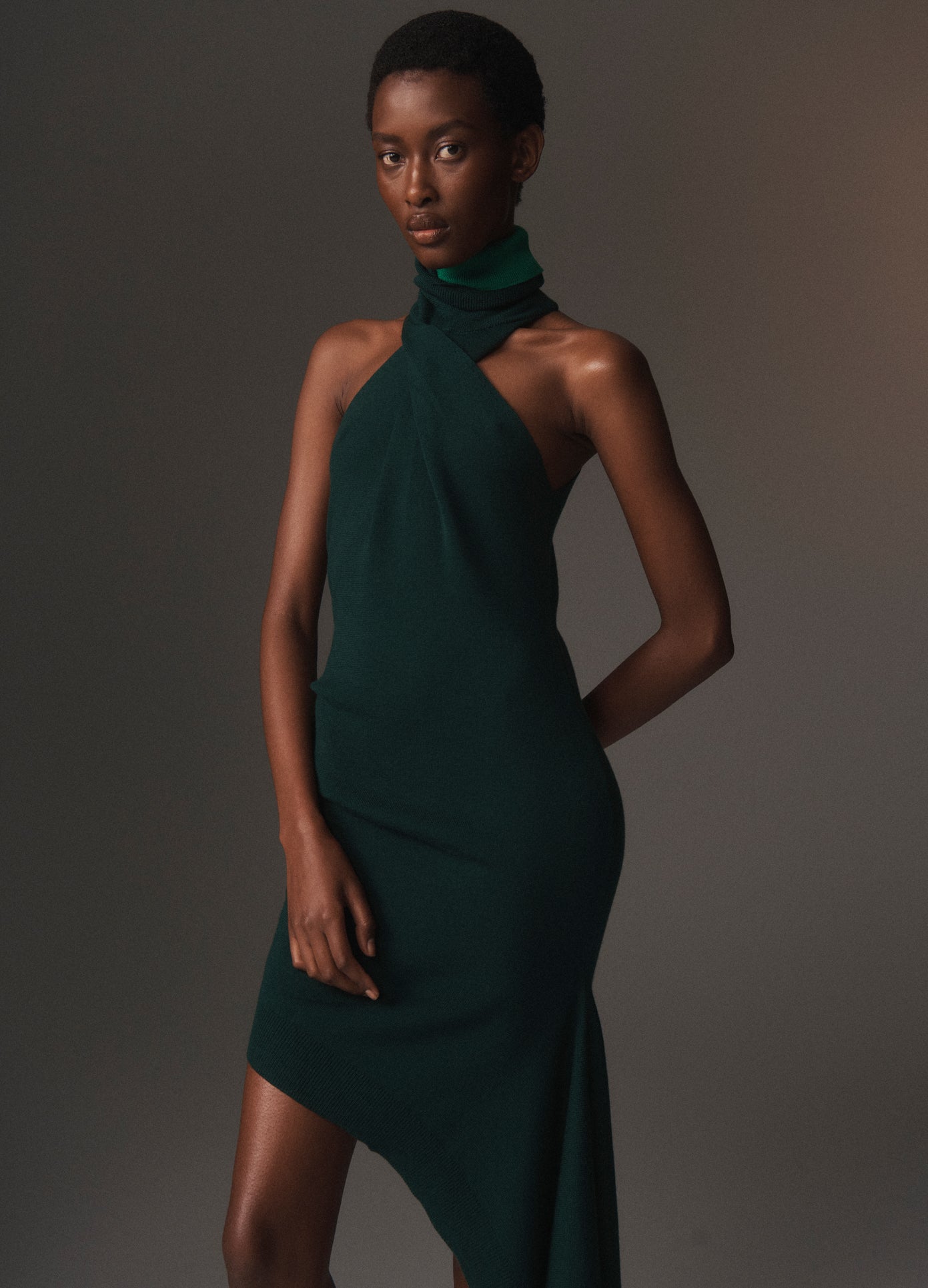 MONSE Twist Turtleneck Mini Dress With Contrast Neck in green and grass on model lookbook image