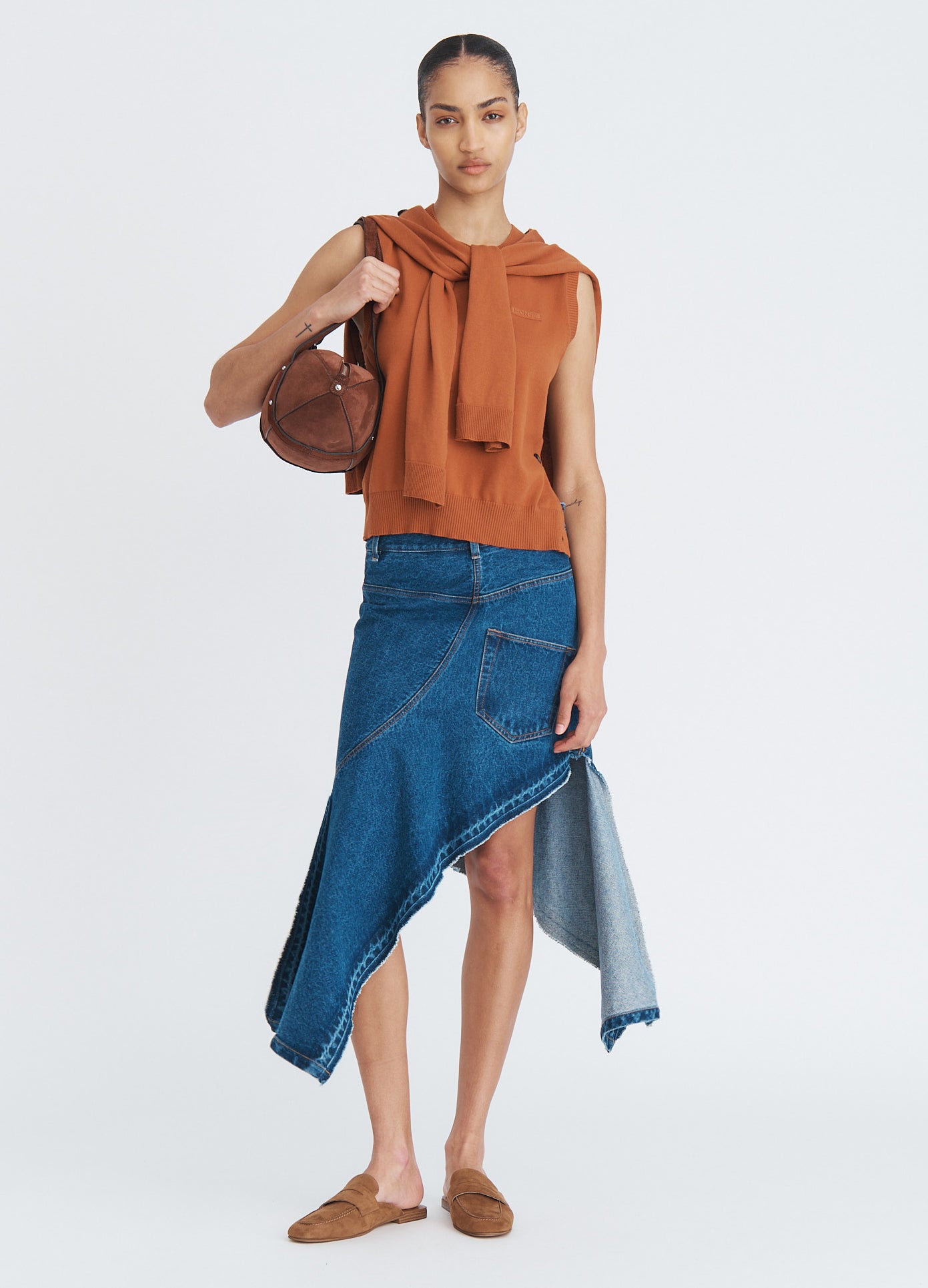 MONSE Twisted Denim Skirt in indigo on model full front view