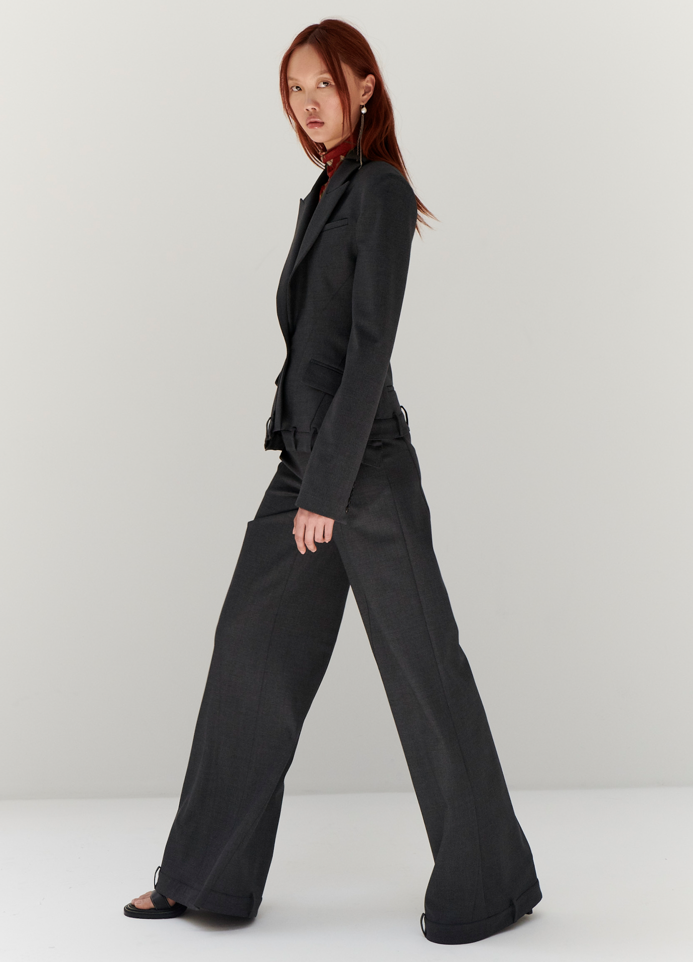 MONSE Upside Down Trouser in Charcoal on model walking full side view