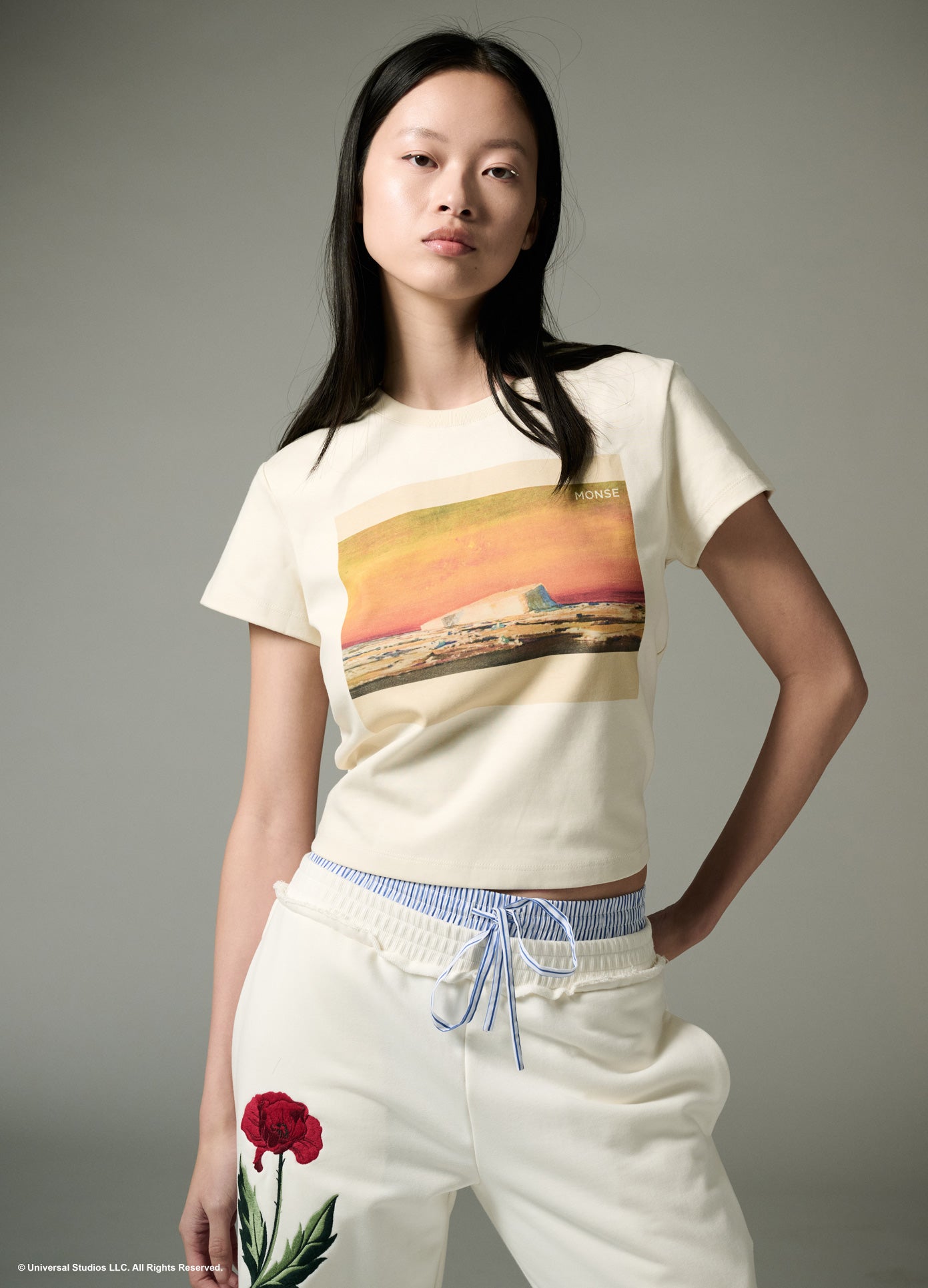 MONSE x Wicked Collaboration I Feel Wicked Sweatpant in ivory on model with t-shirt on front view