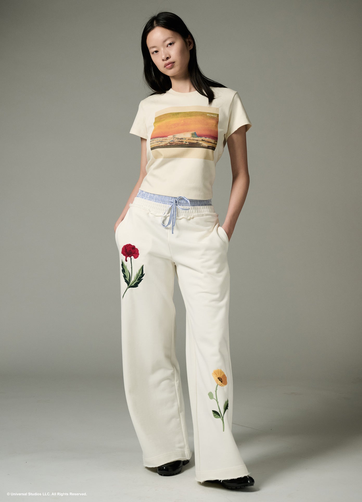 MONSE x Wicked Collaboration I Feel Wicked Sweatpant in ivory on model with t-shirt on full front view