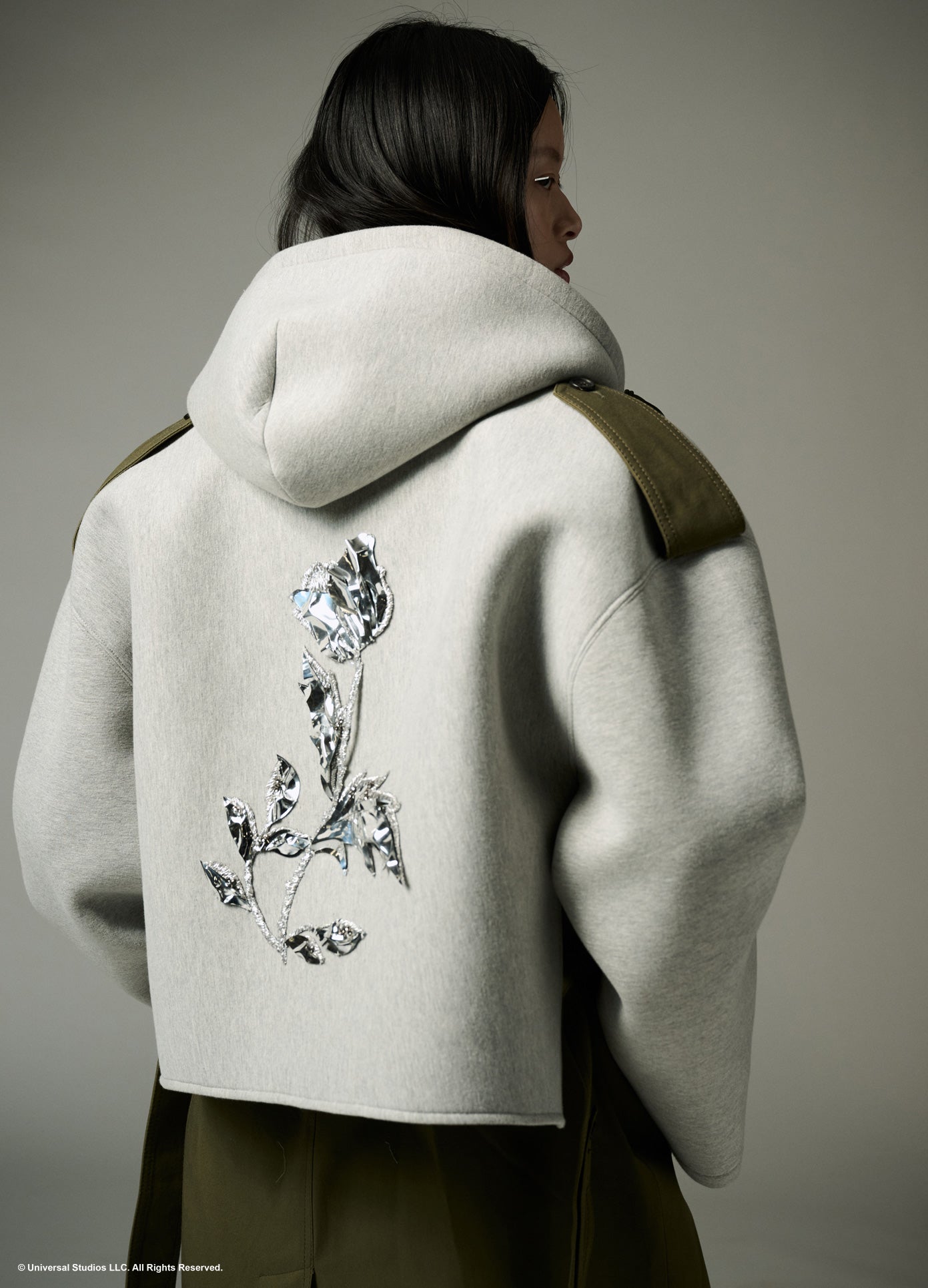 MONSE x Wicked Collaboration Oversized Emerald Hooded Trench in olive and grey on model back view