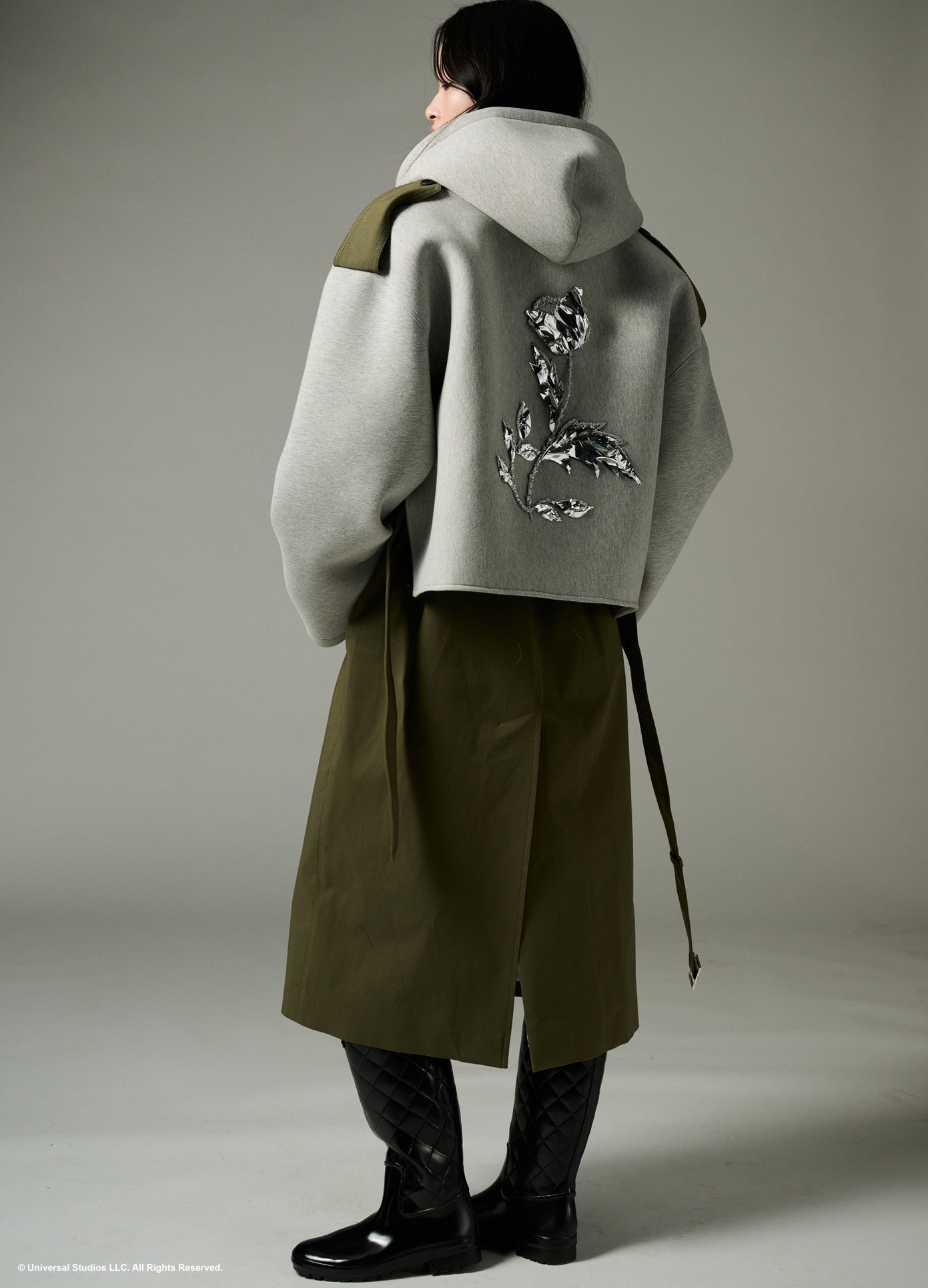 MONSE x Wicked Collaboration Oversized Emerald Hooded Trench in olive and grey on model full back view