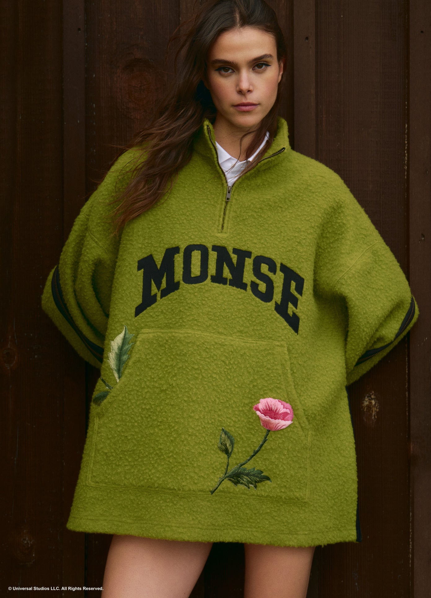MONSE x Wicked Collaboration Oz Varsity Fleece in green on model lifestyle image