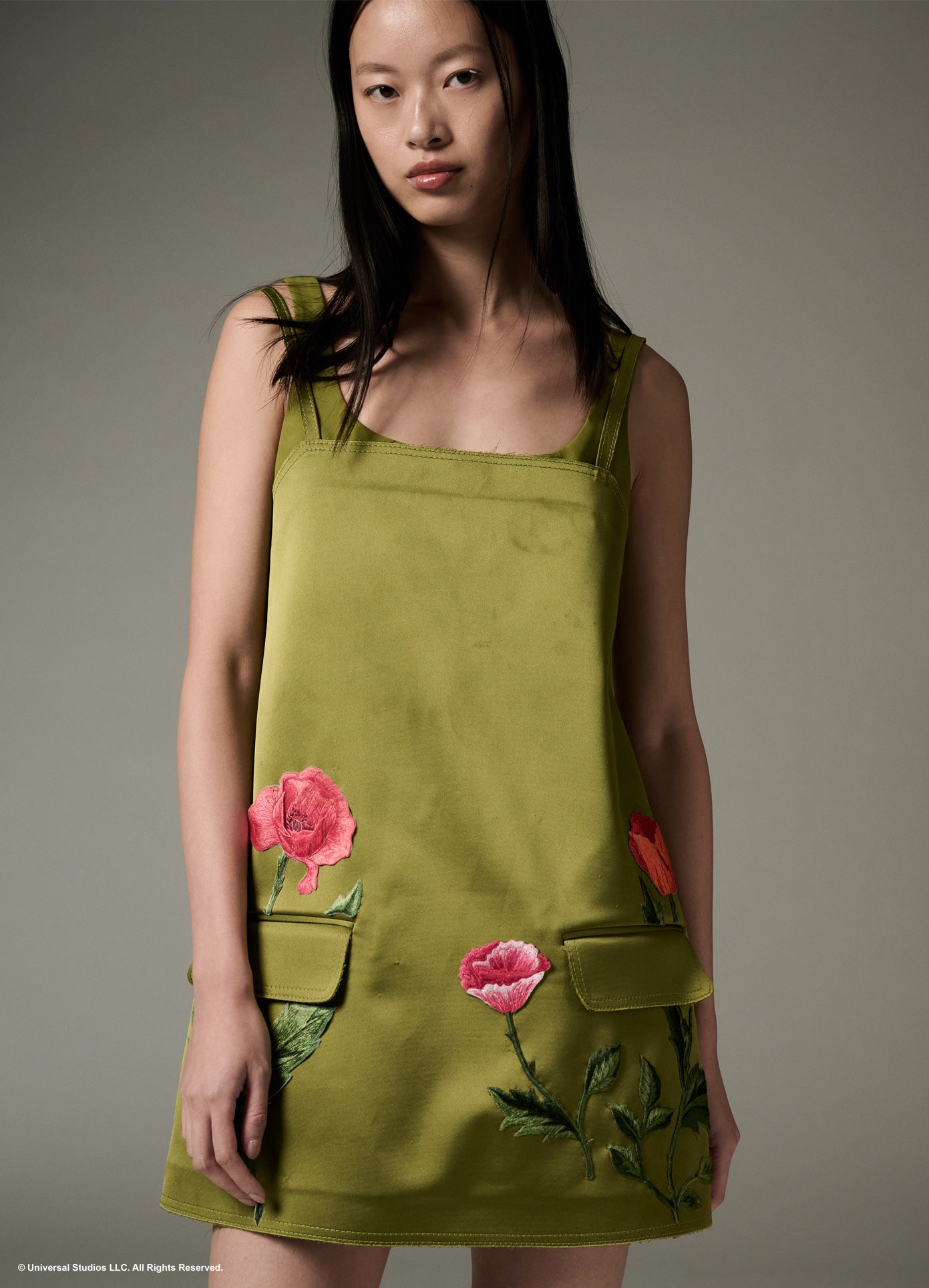 MONSE x Wicked Collaboration The Poppy Dress in olive on model closeup front view