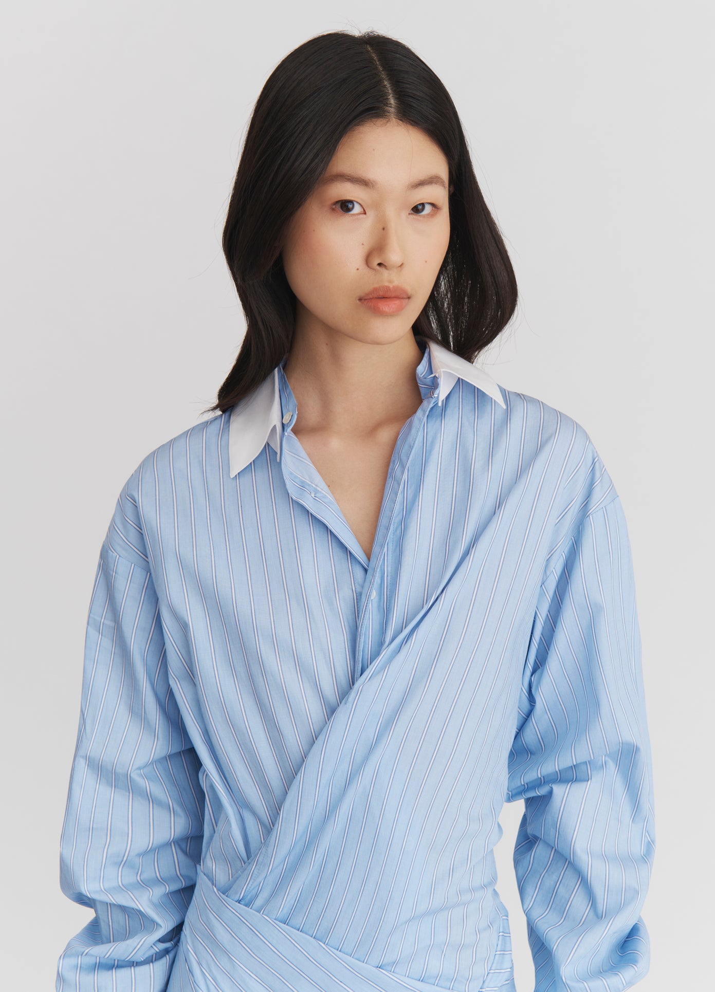 MONSE Wrap Shirt Dress in Oxford Blue and White on model front view