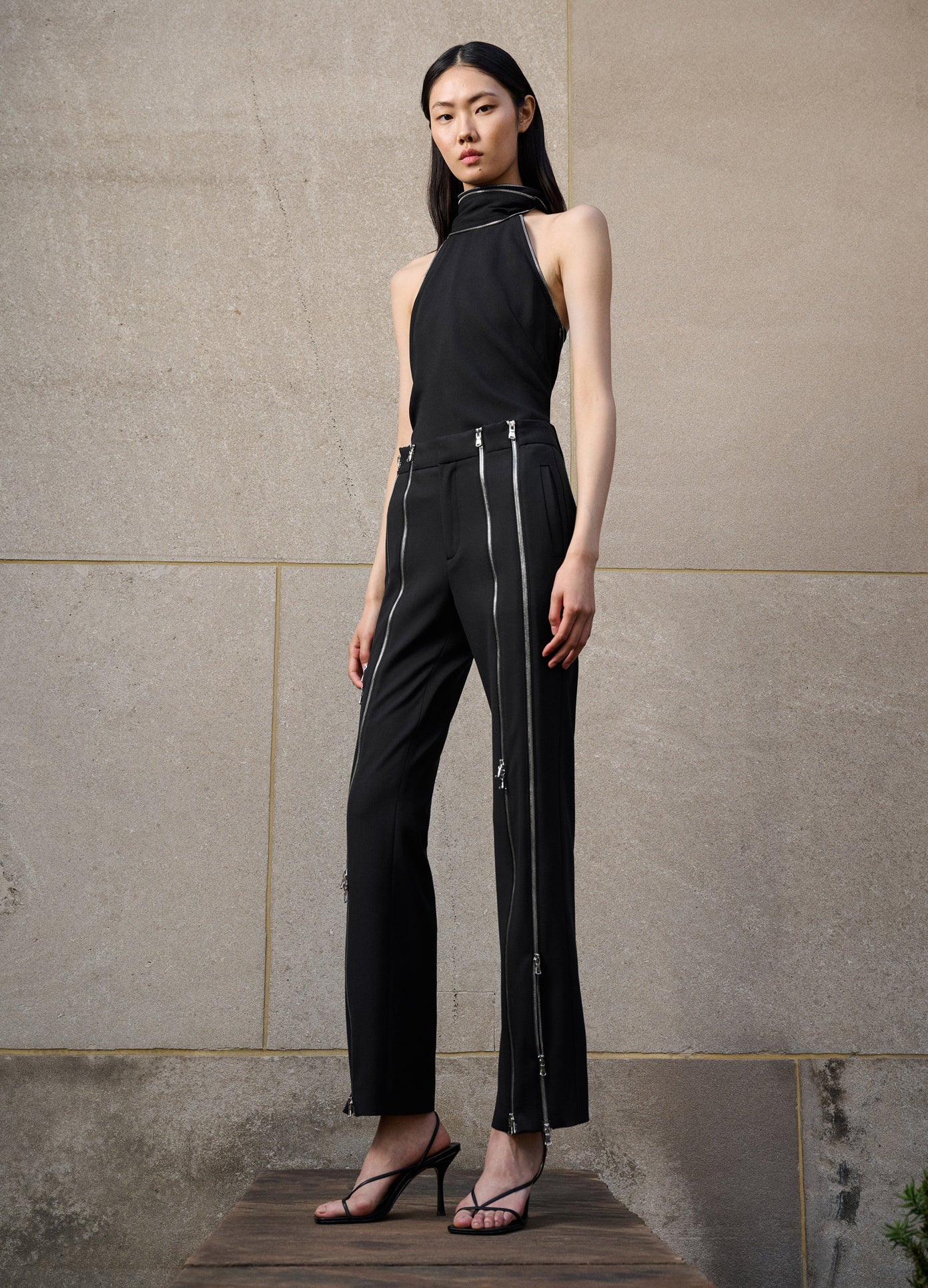 MONSE Zippered Tailored Trousers in Black on model editorial image