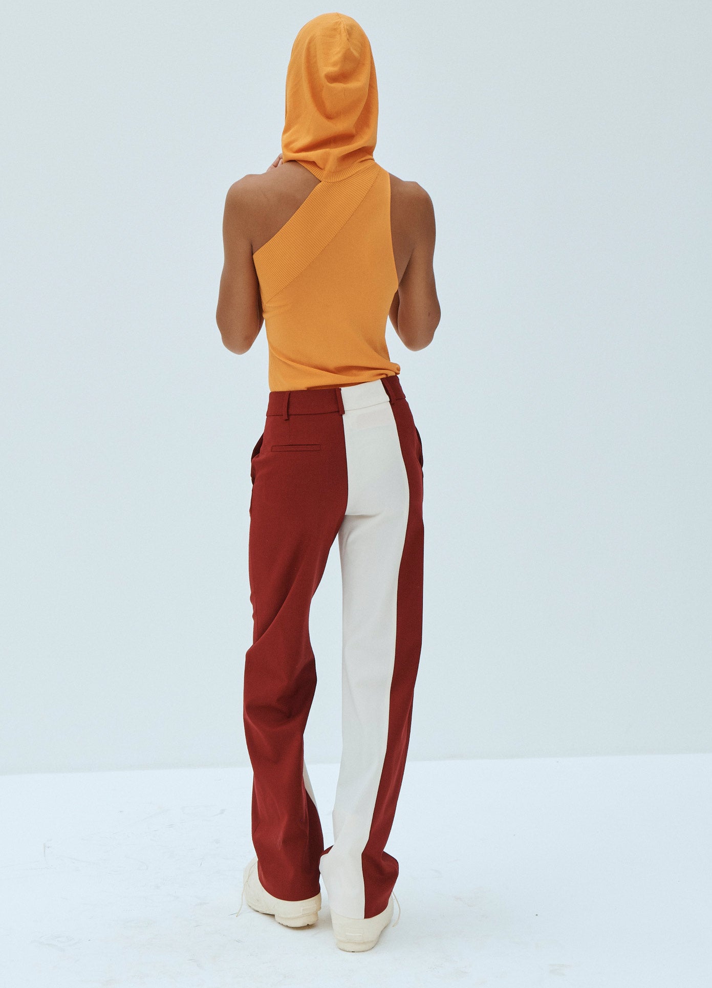 MONSE Asymmetrical Knit Hoodie in Orange on Model Back View