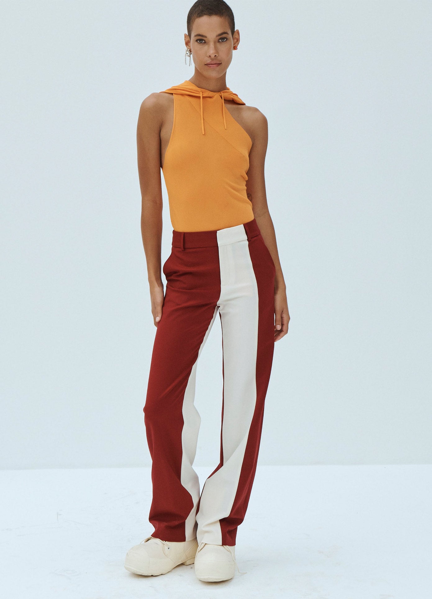 MONSE Asymmetrical Knit Hoodie in Orange on Model Front View