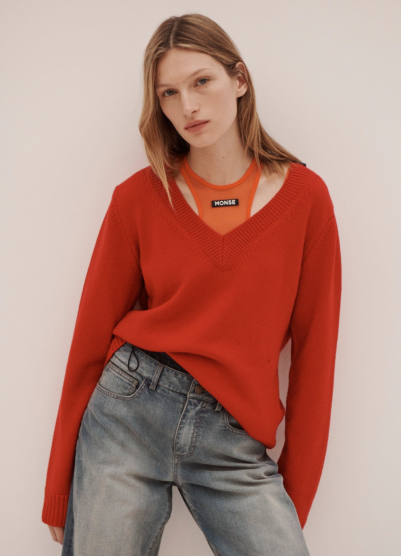 MONSE Back Twist Knit Pullover is MONSE Red on Model Front View