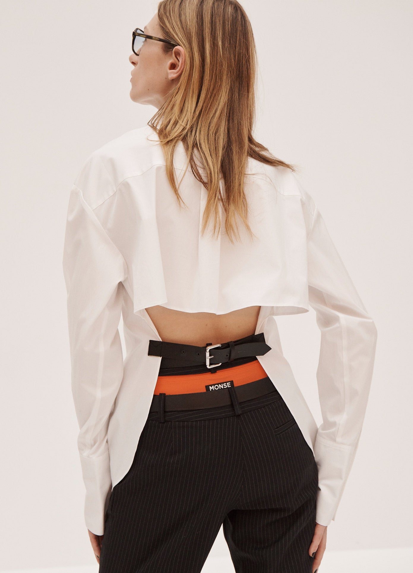 MONSE Belted Back Shirt in White on Model Back View