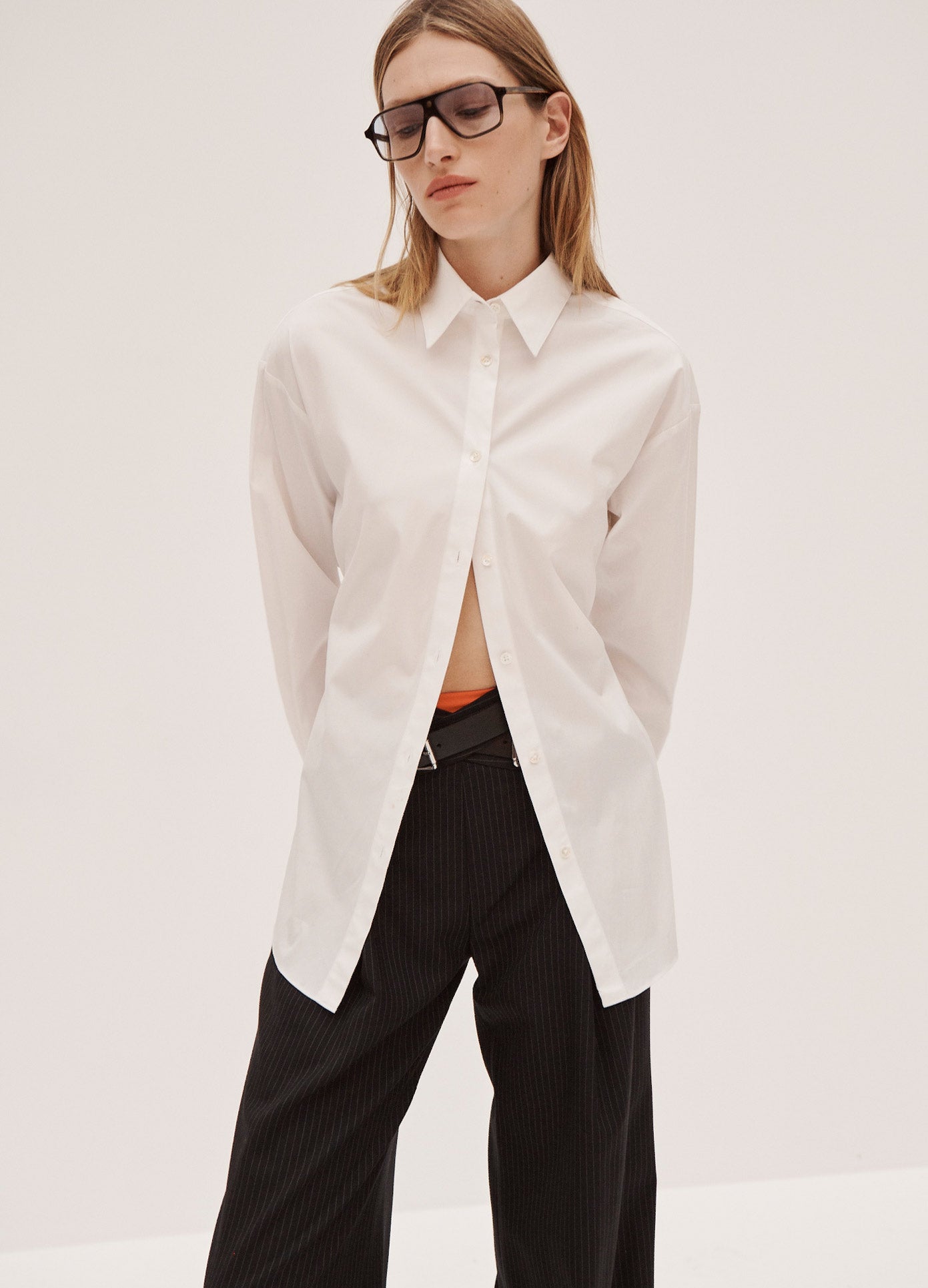 MONSE Belted Back Shirt in White on Model Front View