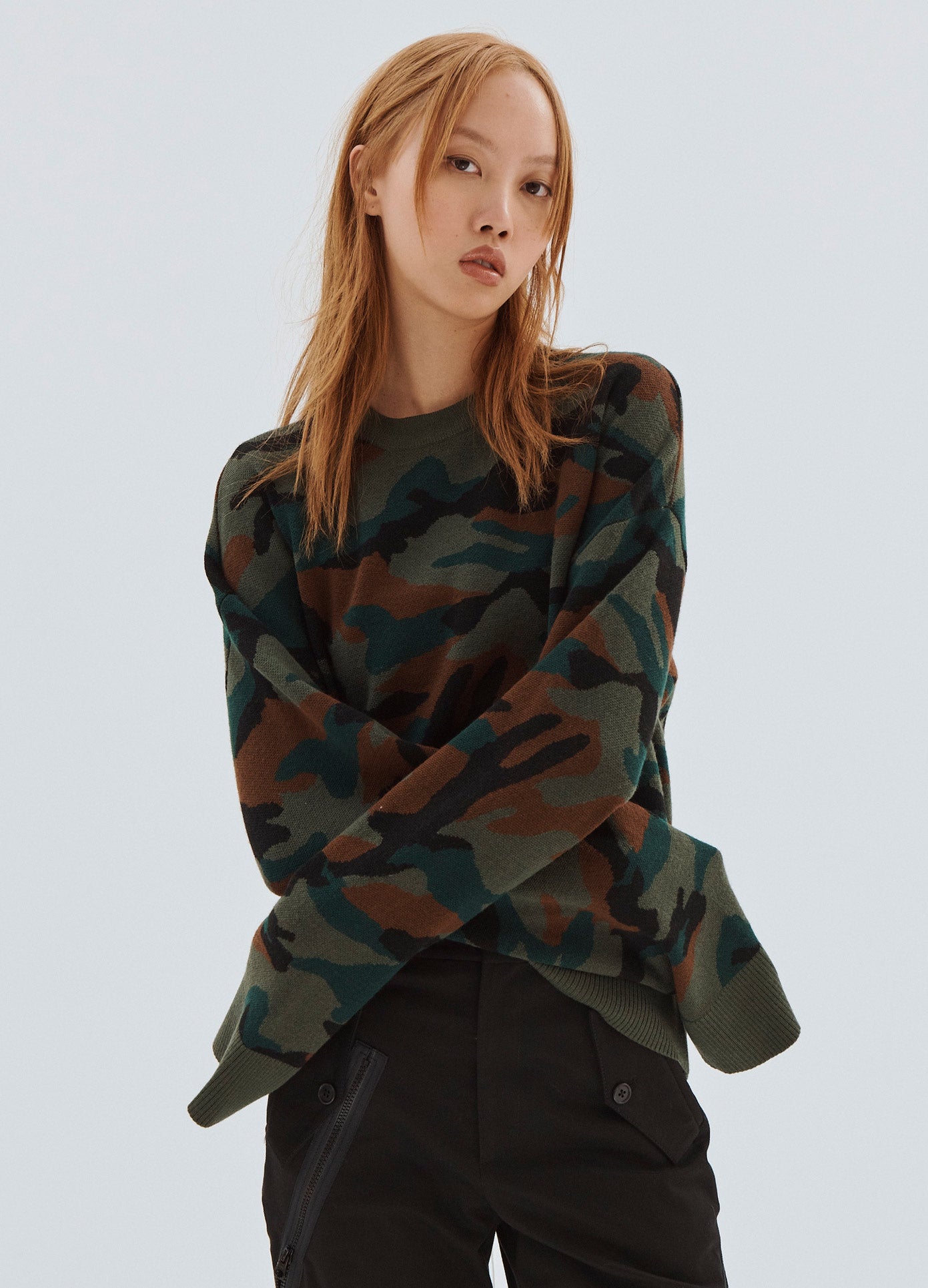 MONSE Boxy Camo Laced Up Sweater on Model with Arms Crossed Front View
