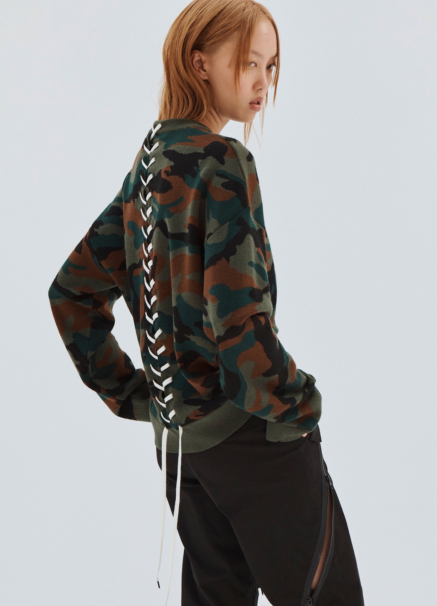 MONSE Boxy Camo Laced Up Sweater on Model Full Side View