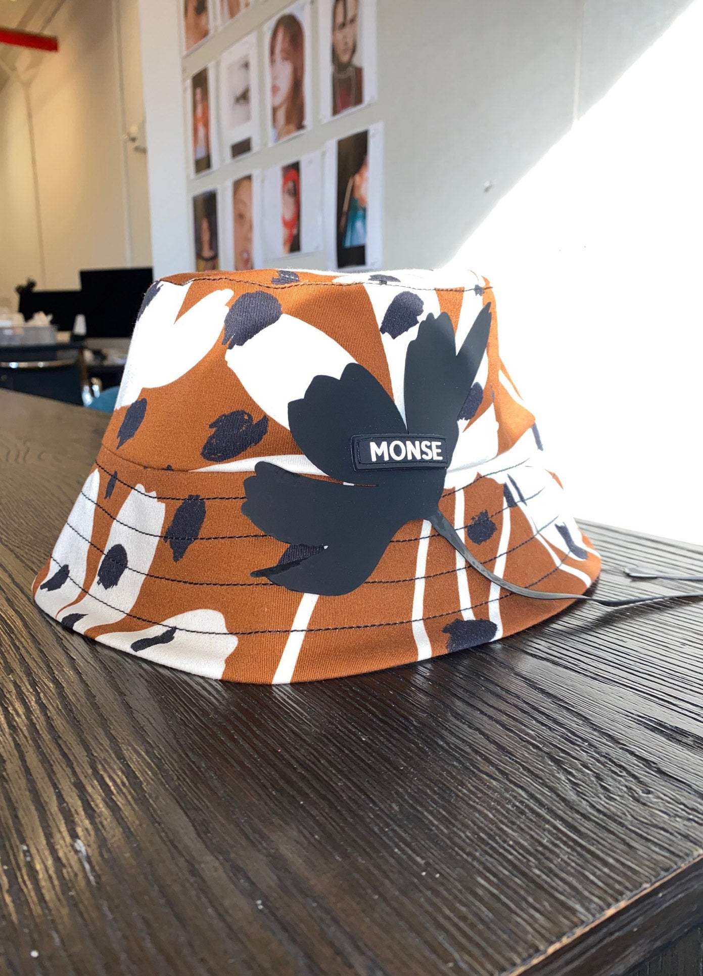 MONSE Bucket Hat with Rubber Flowers in Brown Multi