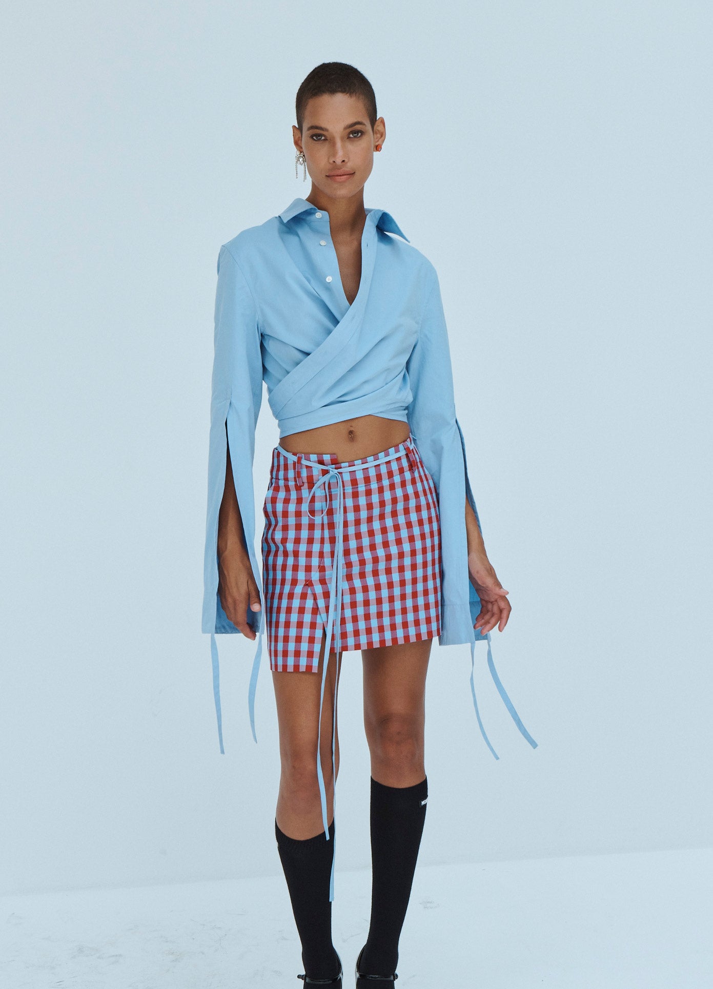 MONSE Check Deconstructed Mini Skirt in Ruby and Blue on Model Front View