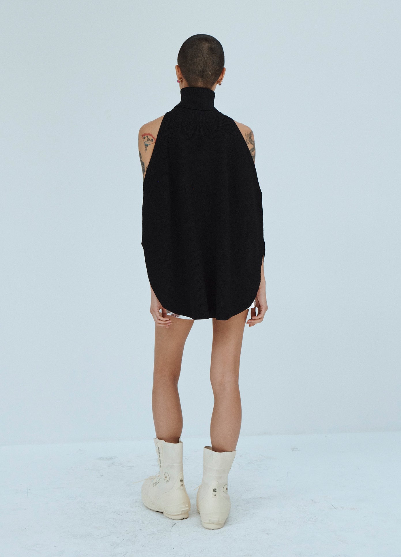 MONSE Cold Shoulder Turtleneck Sweater in Black on Model Back View