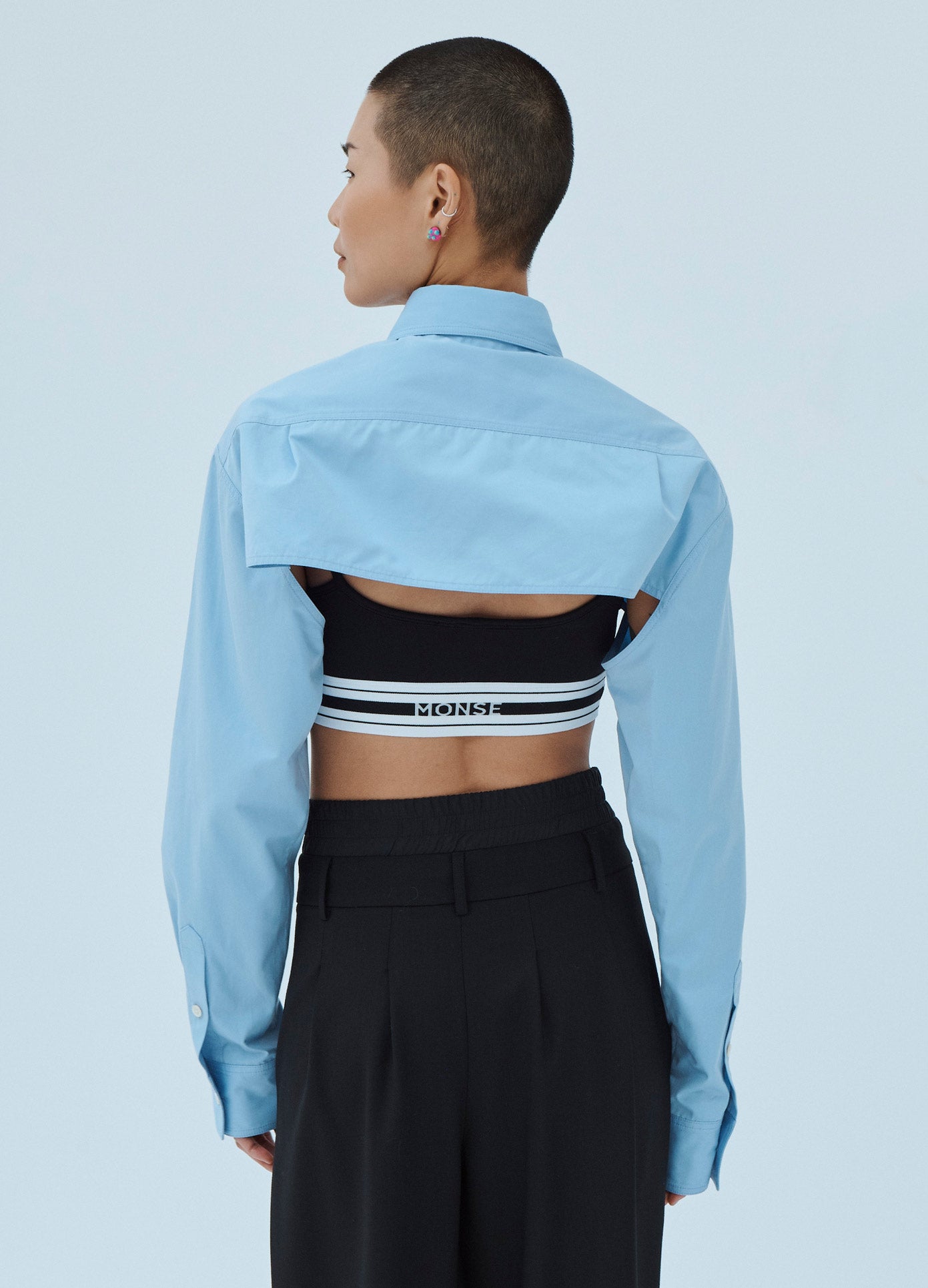 MONSE Cropped Button Down Shirt in Blue on Model Back View
