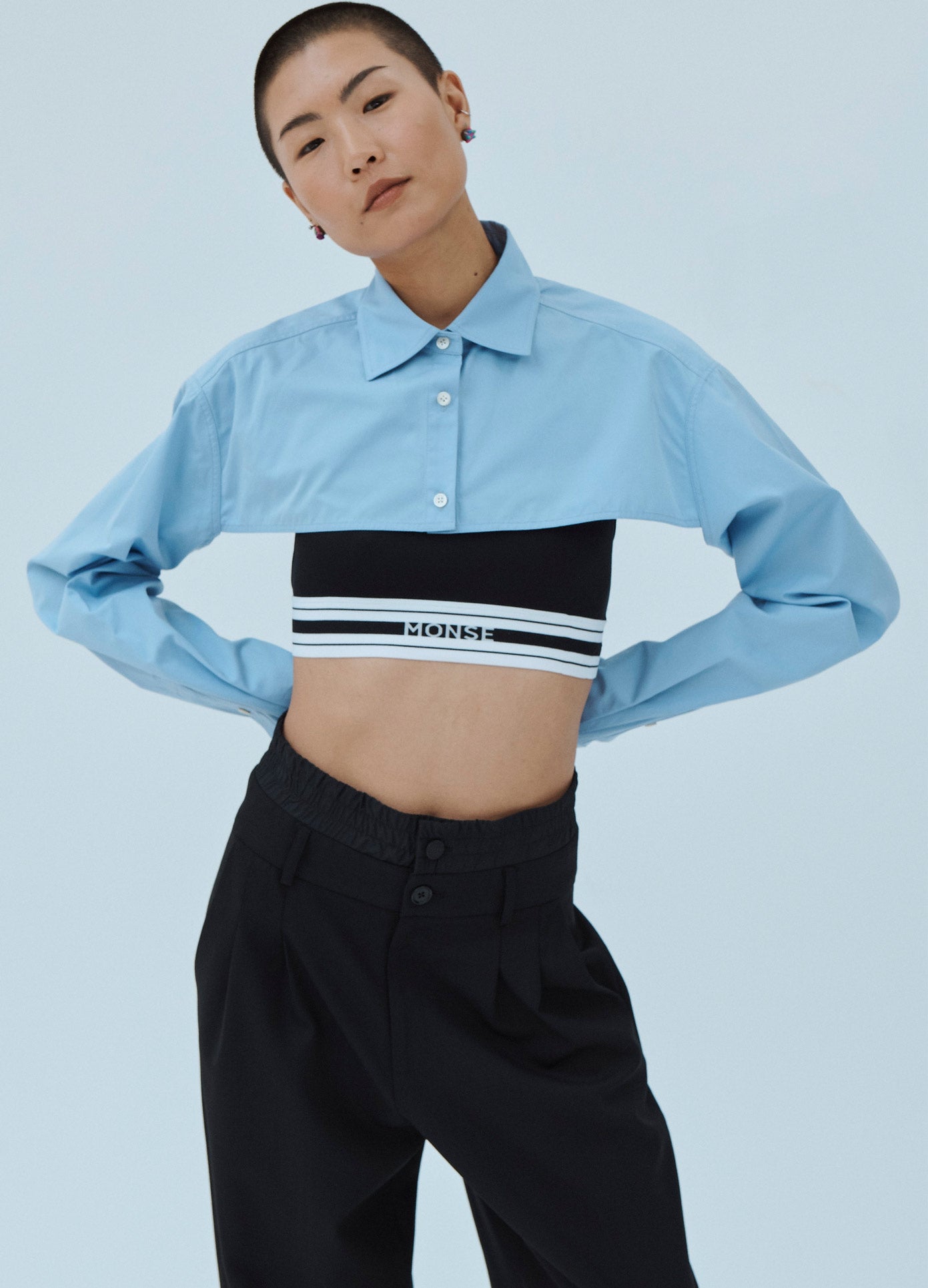 MONSE Cropped Button Down Shirt in Blue on Model Front View
