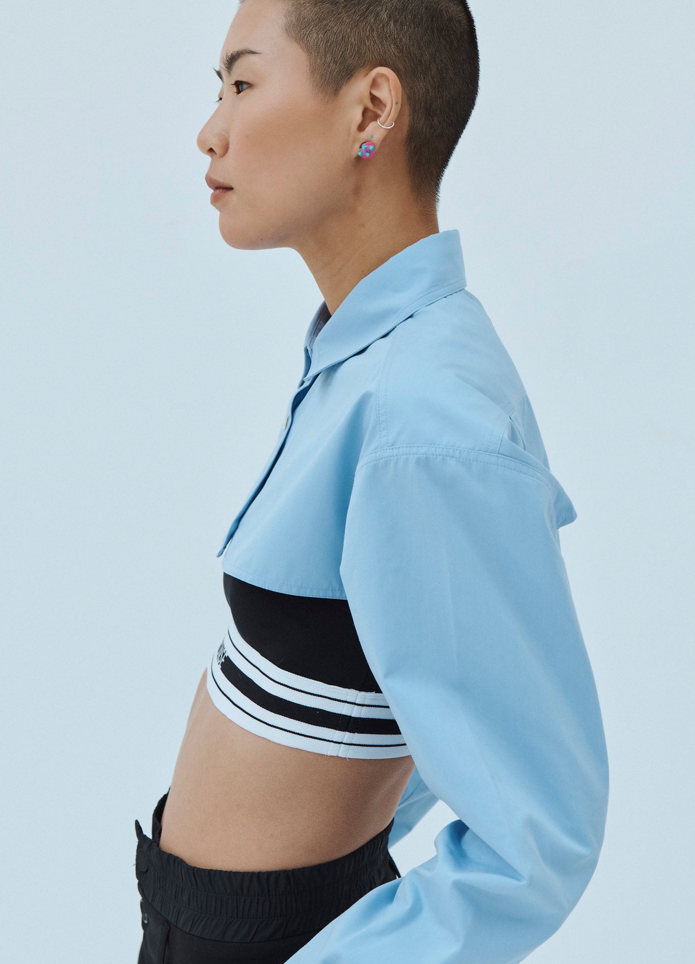 MONSE Cropped Button Down Shirt in Blue on Model Side View