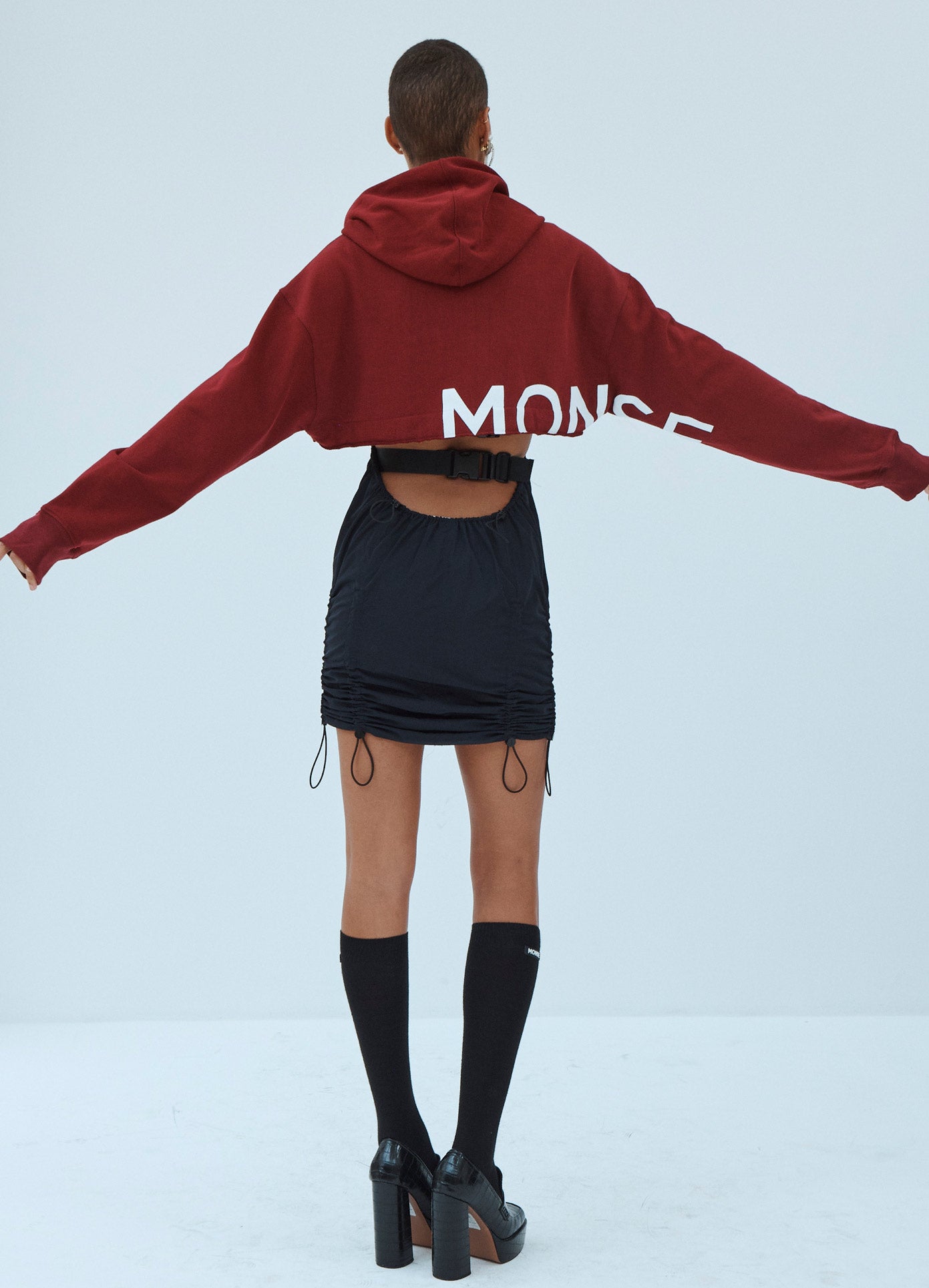 MONSE Cropped Hoodie in Dark Ruby on Model Back View