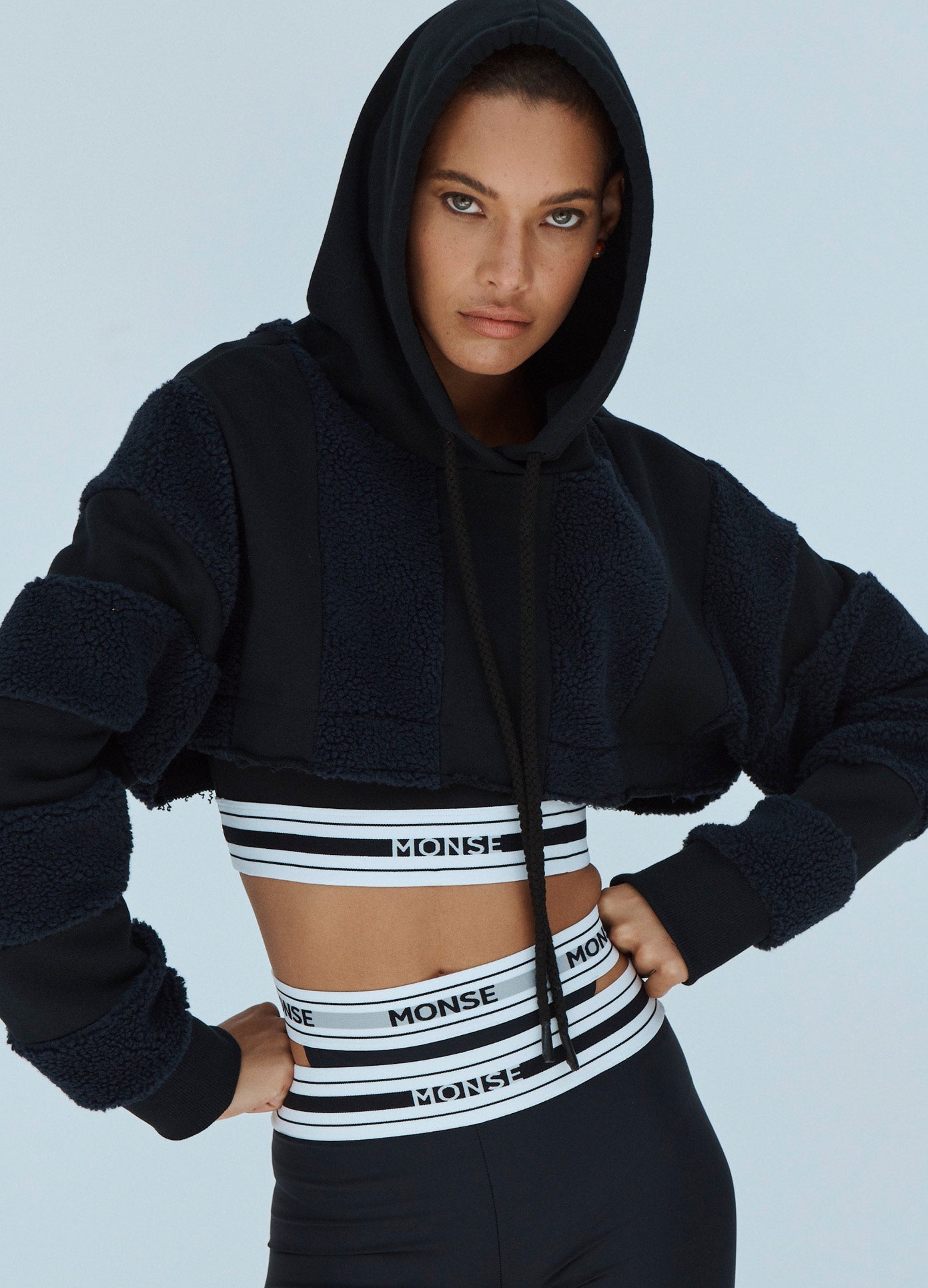 MONSE Cropped Hoodie in Black and Midnight on Model Front View