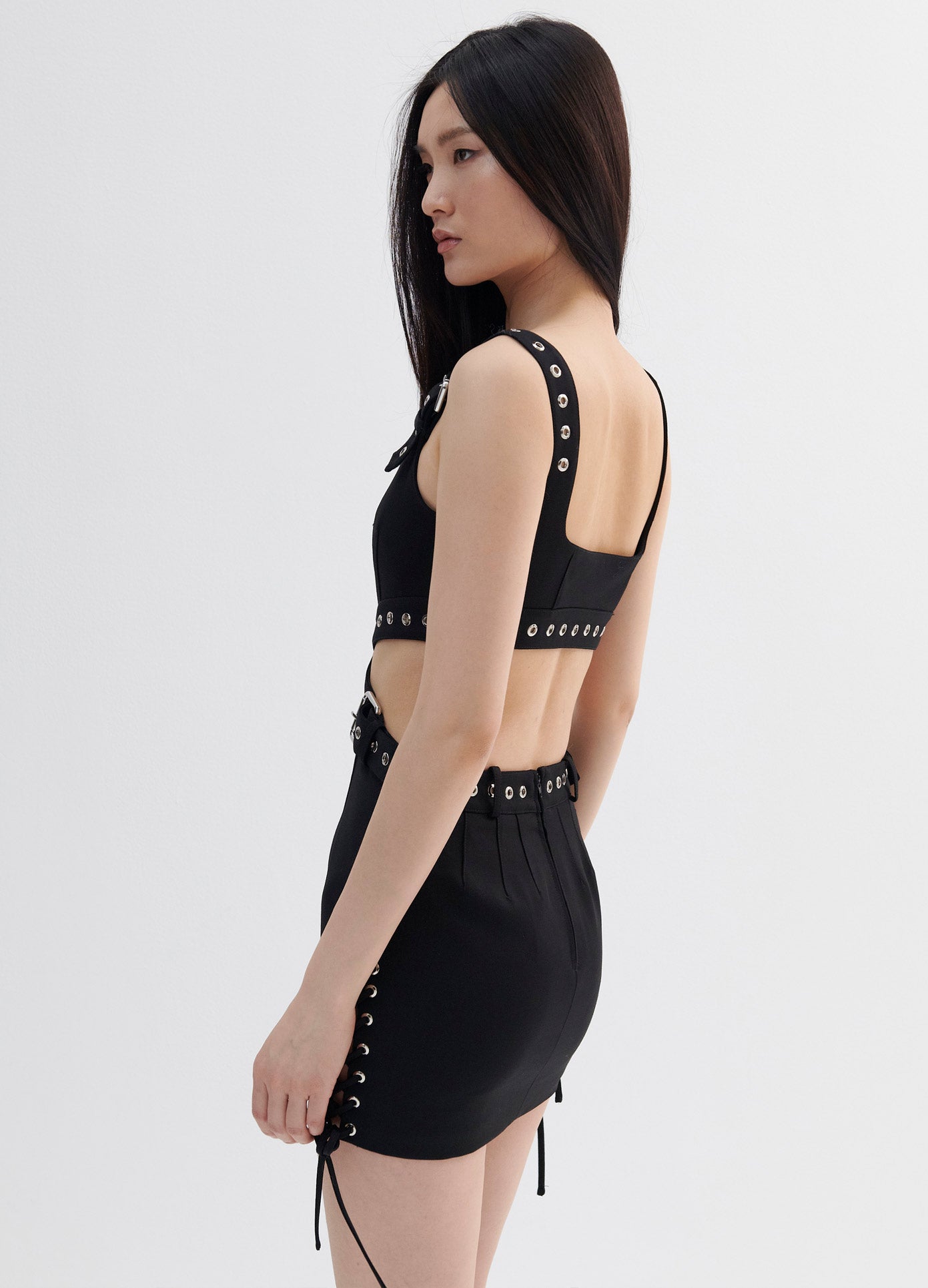 MONSE Cut Out Belted Detail Dress in Black on Model Side View
