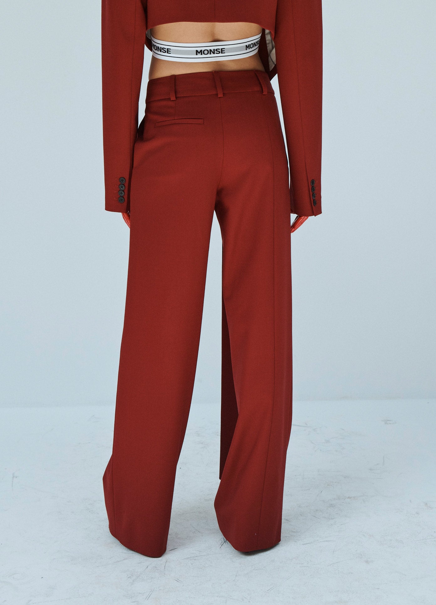 MONSE Deconstructed Trouser in Ruby on Model Back Detail View