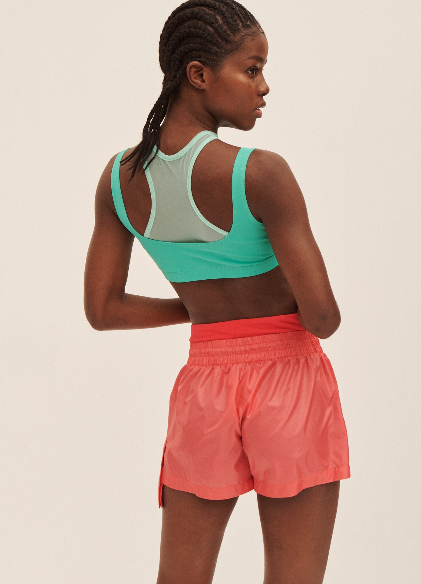 MONSE Double Layered Sports Bra in Turquoise on Model Back View