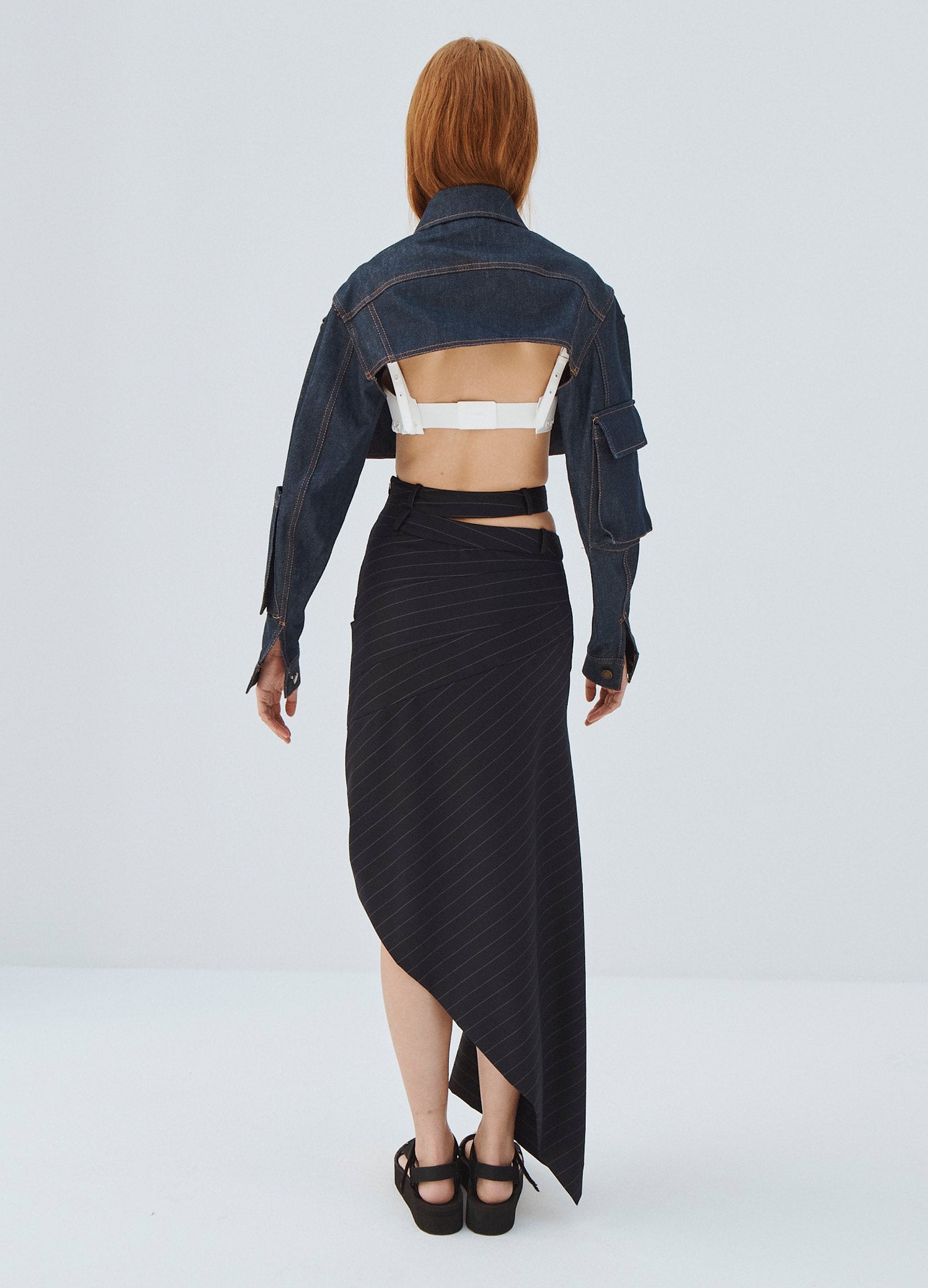 MONSE Double Waistband Asymmetrical Skirt in Midnight on Model Full Back View