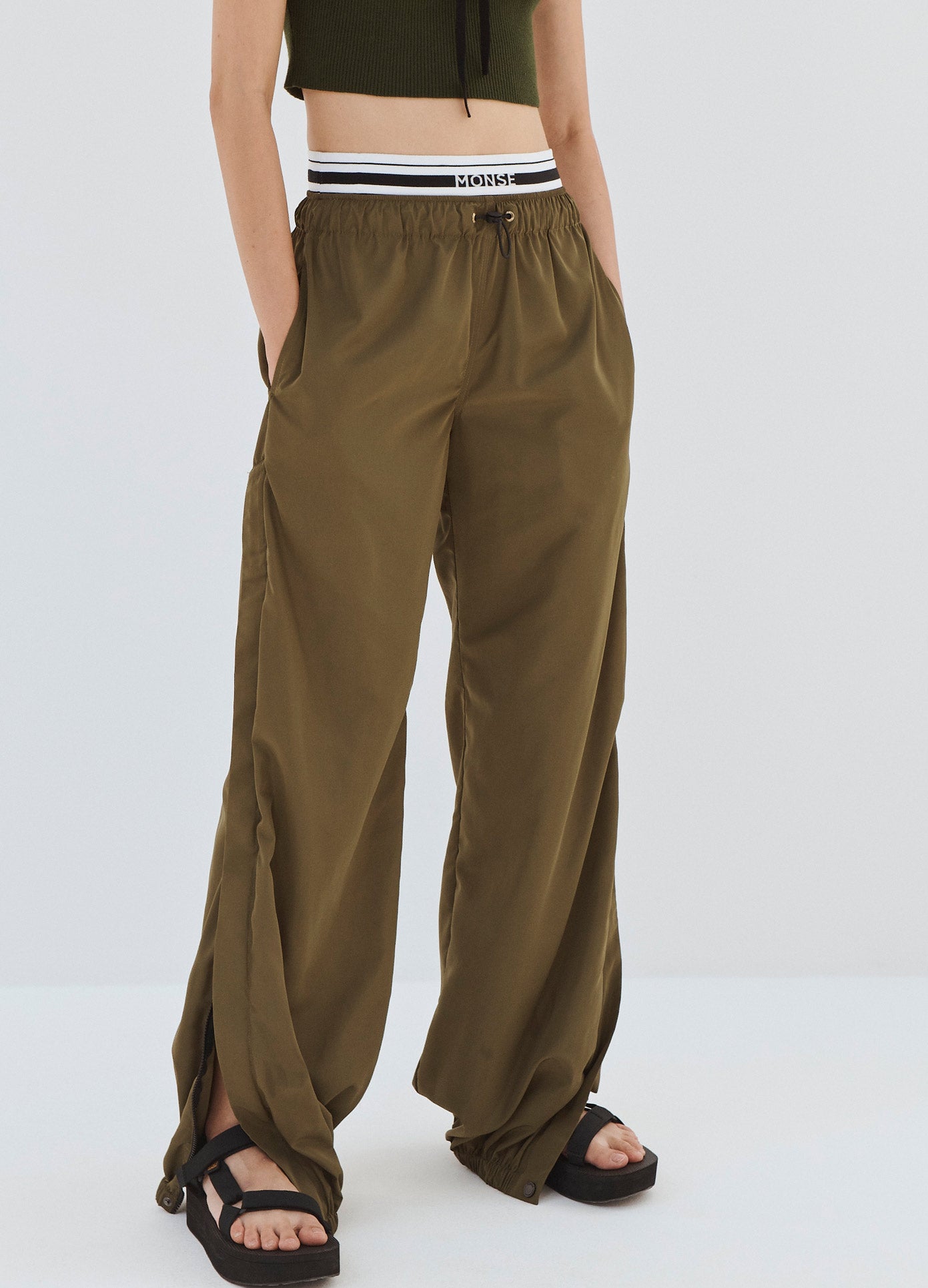 monse double wastband track pants olive on model pants detailed front view