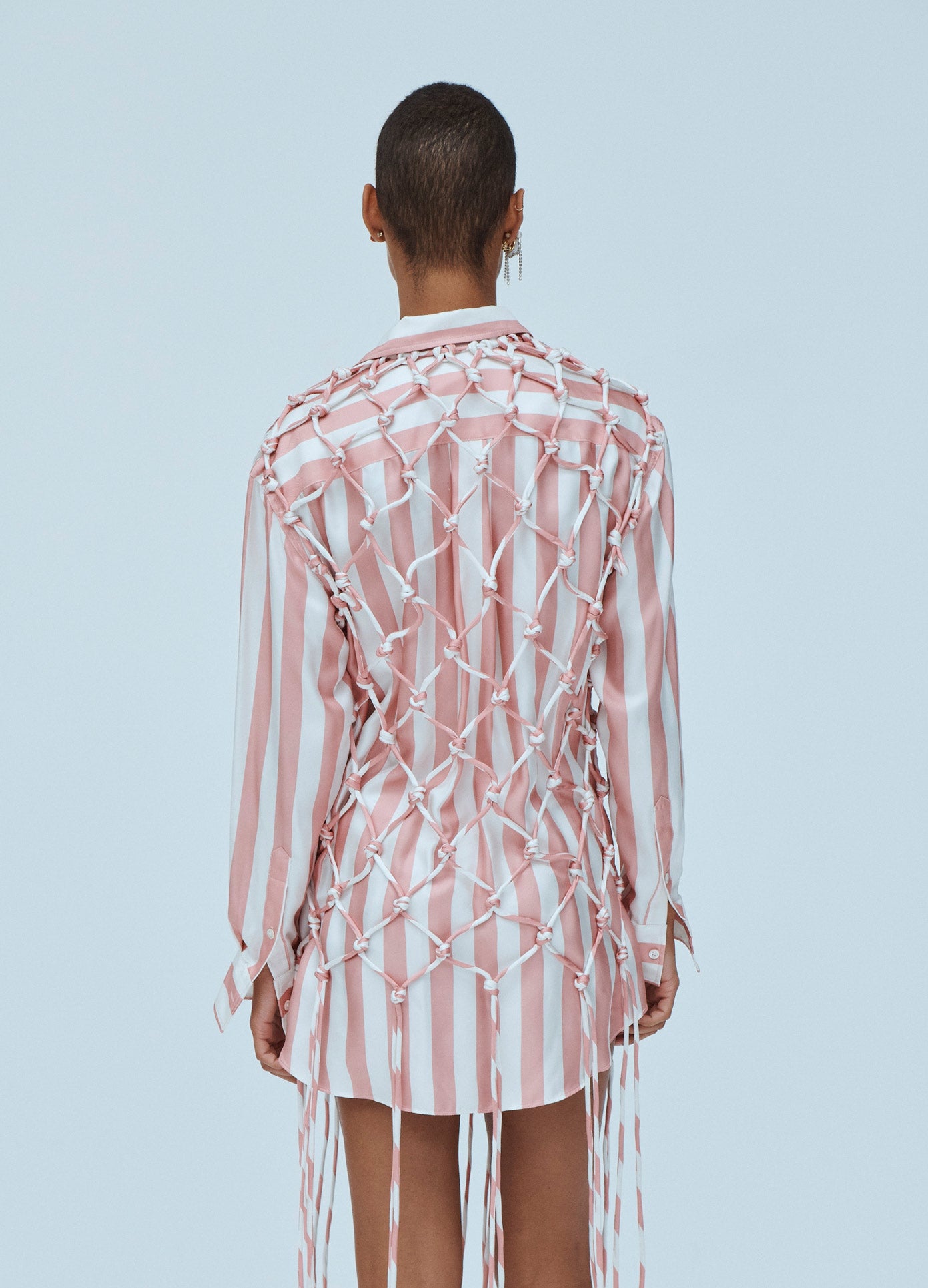 MONSE Fishnet Detail Striped Shirt Dress in Pink and Ivory on Model Back View