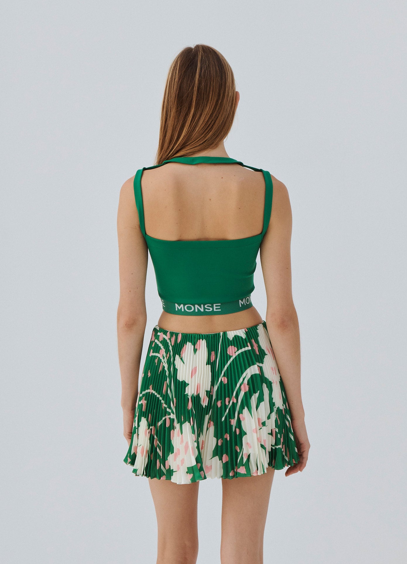 MONSE Floral Pleated Mini Skirt in Green Multi on Model Back View