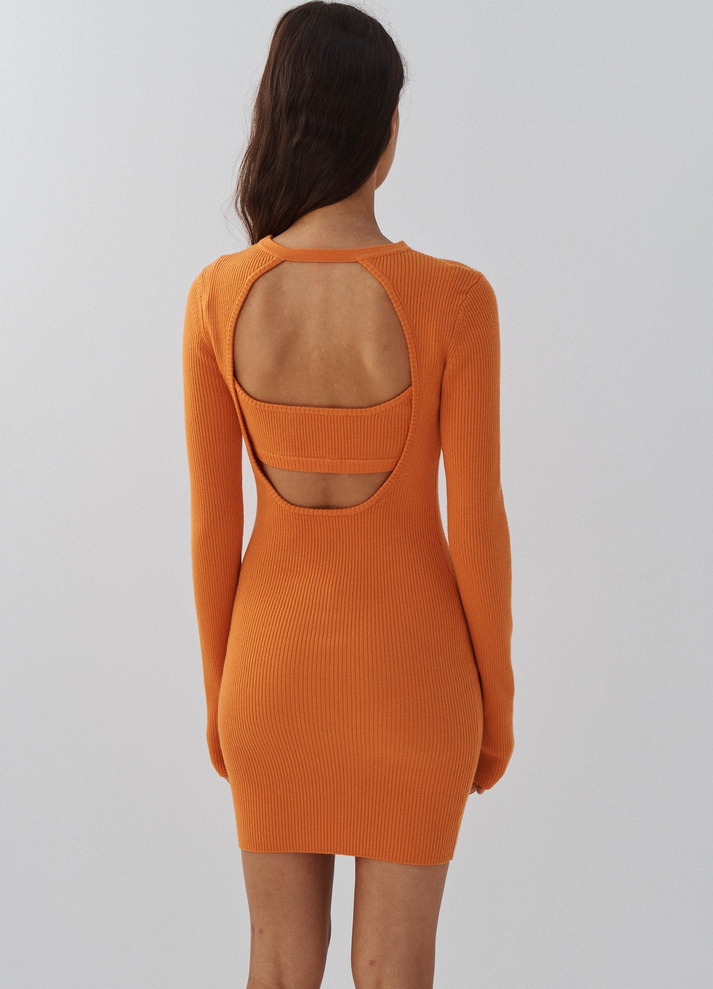 MONSE Front Cut Out Tie Detail Mini Knit Dress in Orange on Model Back View