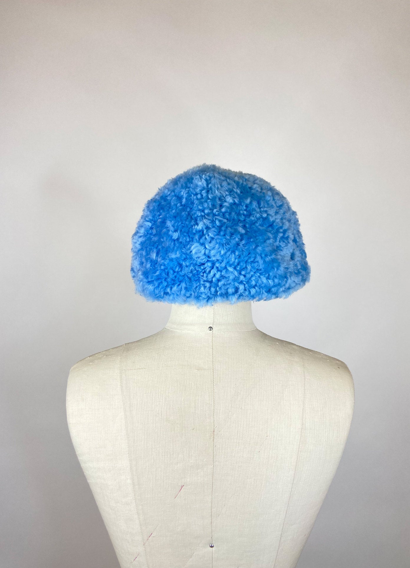 MONSE Fur Baseball Cap in Light Blue on Mannequin Head Back View