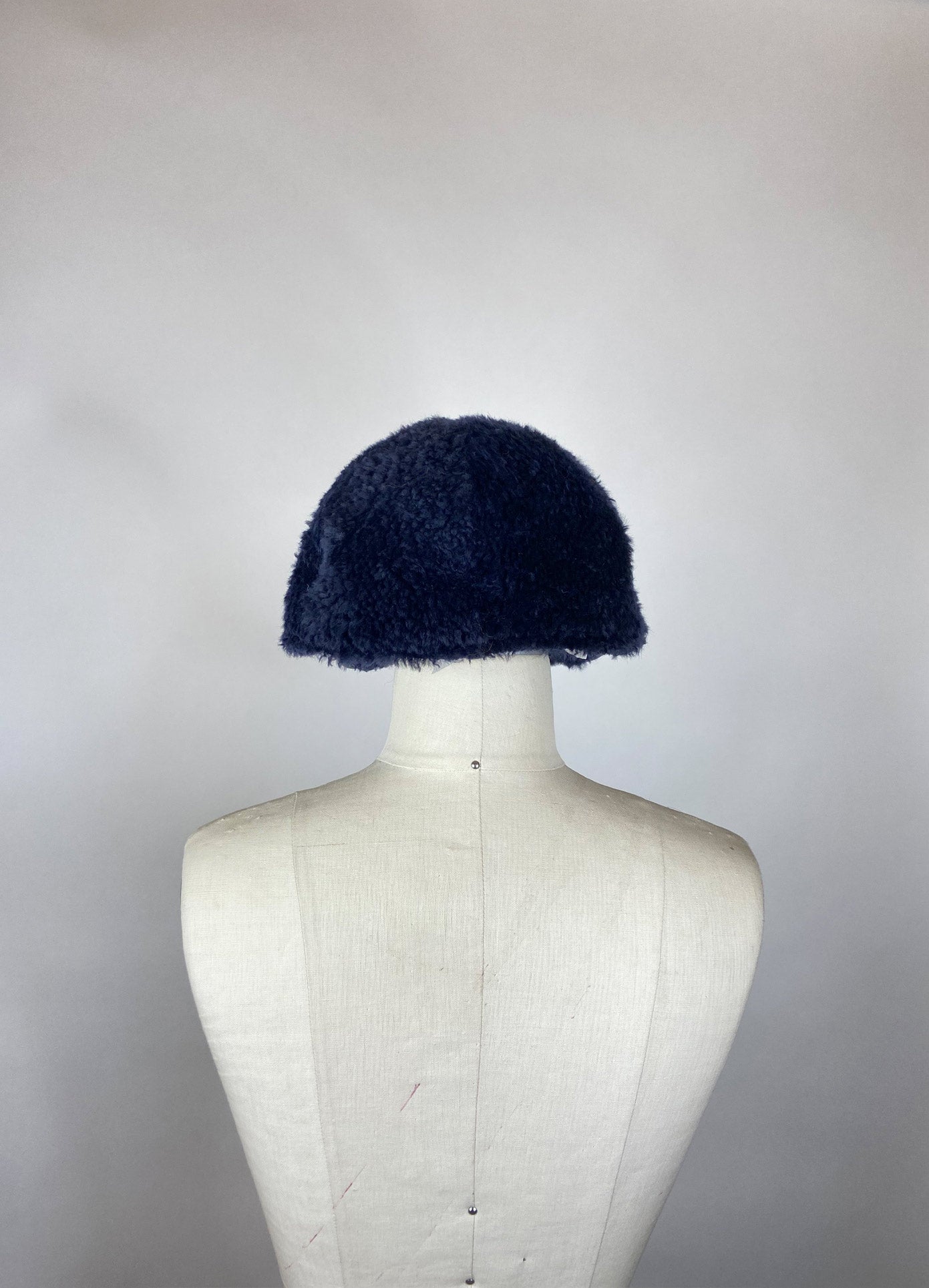 MONSE Fur Baseball Cap in Midnight on Mannequin Head Back View