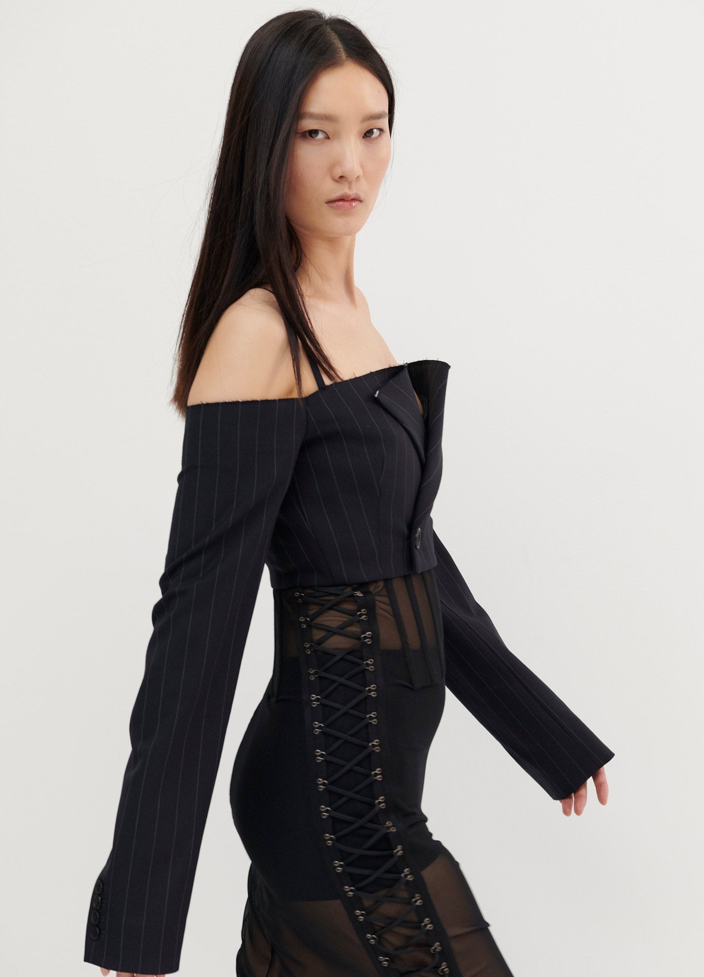 MONSE High Waisted Mesh Skirt in Black on Model Side View
