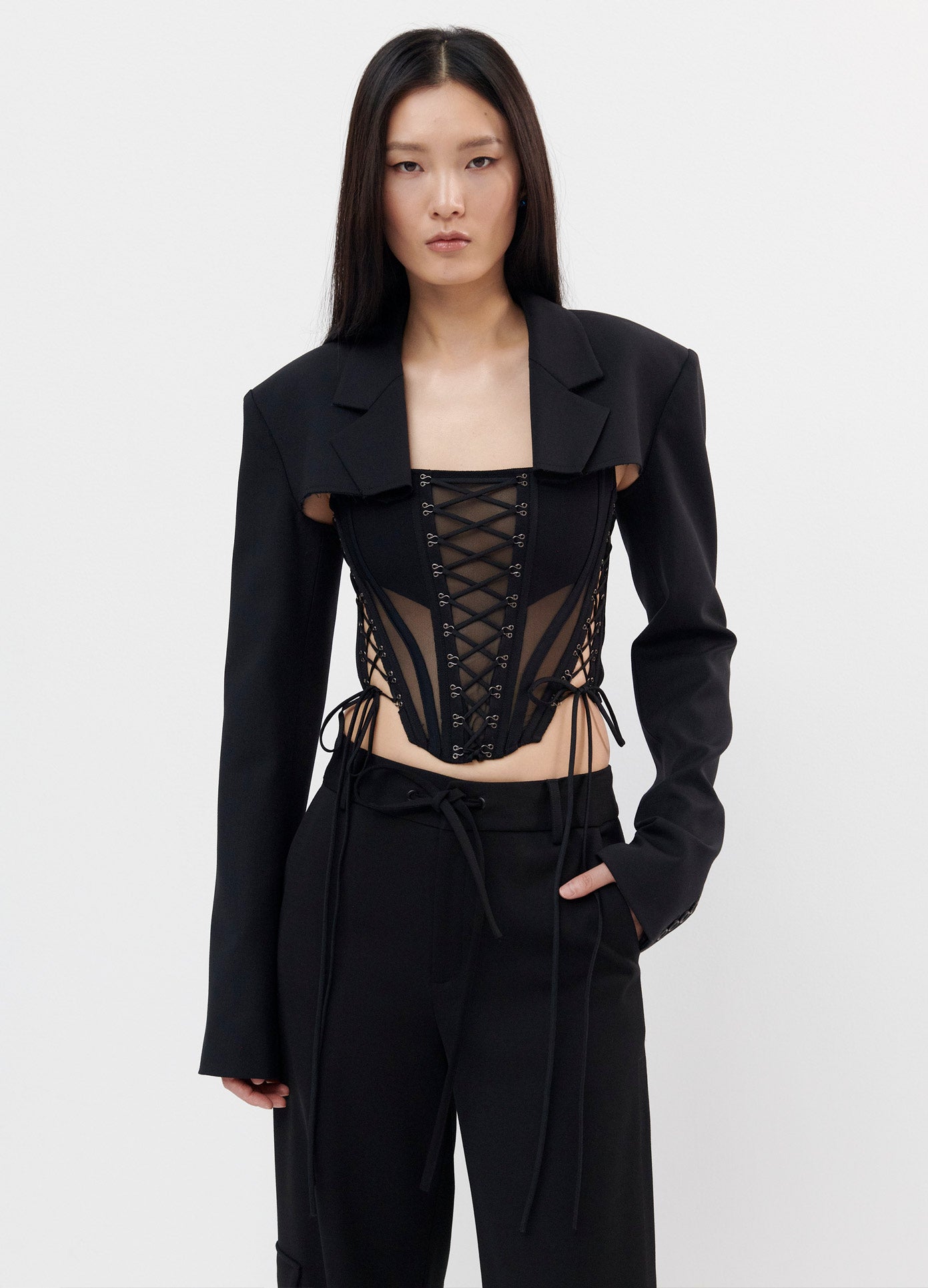 MONSE Laced Bustier in Black on Model Wearing Jacket Front View