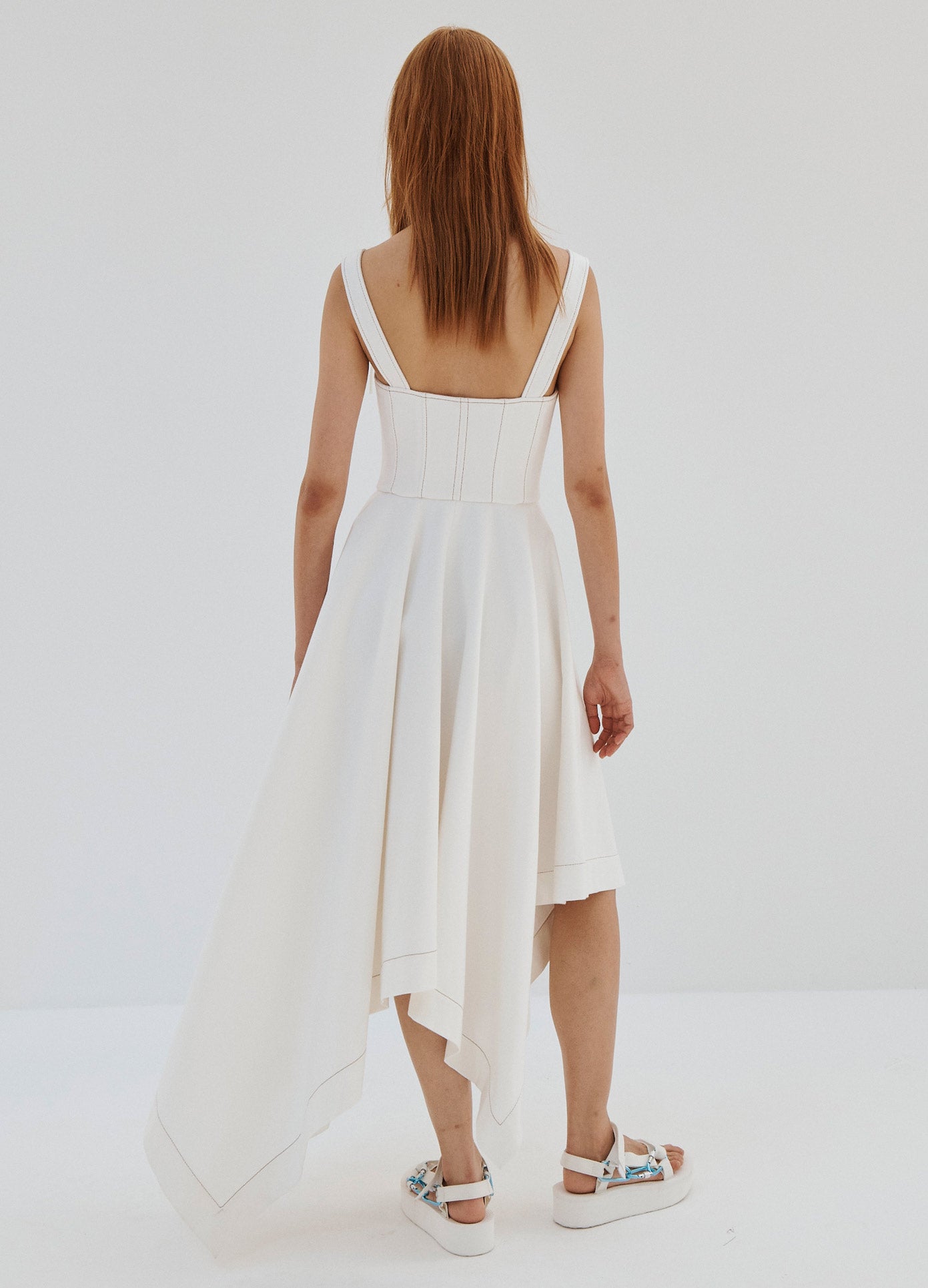 MONSE Laced Front Sleeveless Denim Dress in White on Model Full Back View