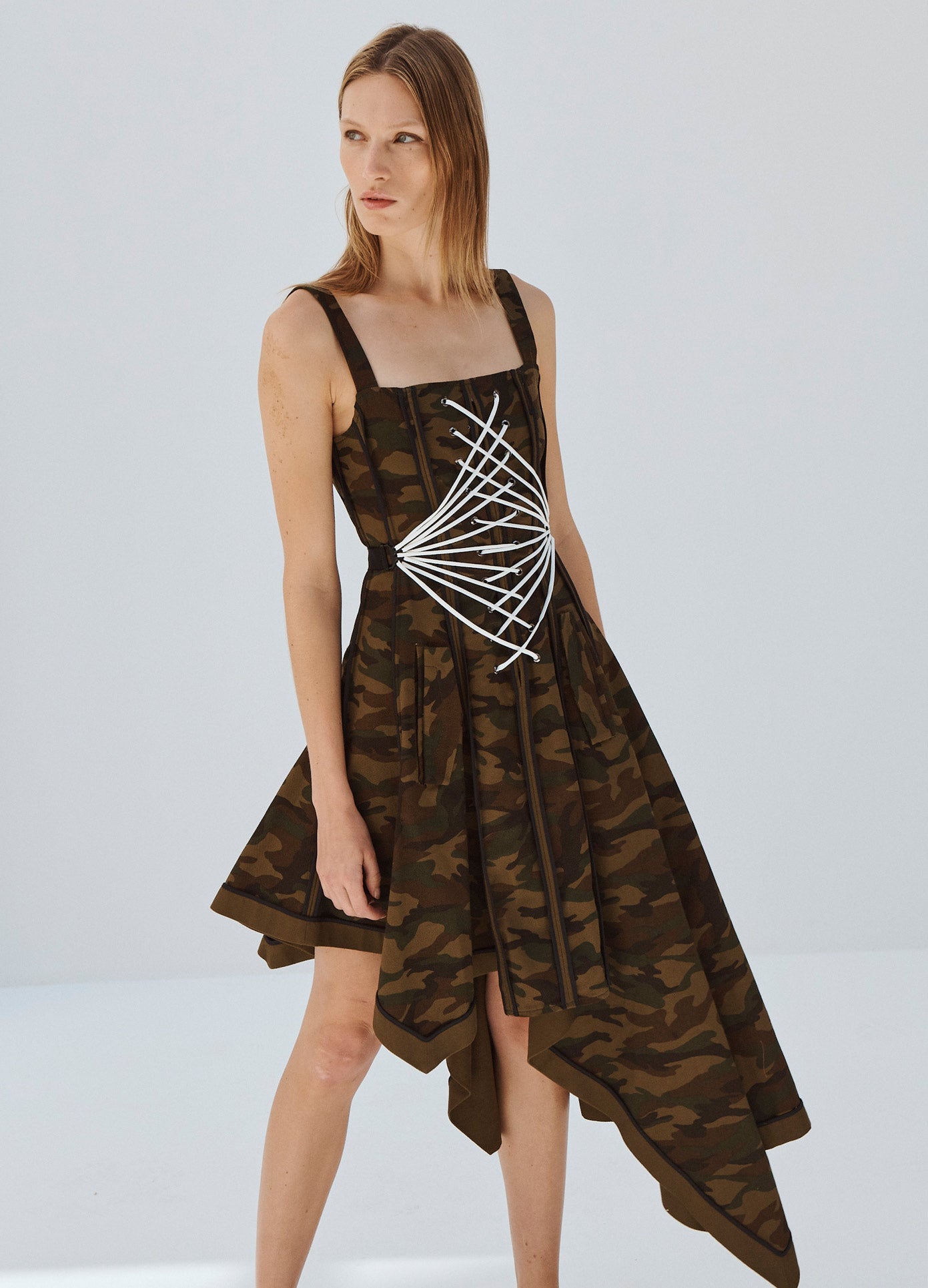 MONSE Laced Up Binding Coat Dress in Camo Print on Model Looking Right Front View