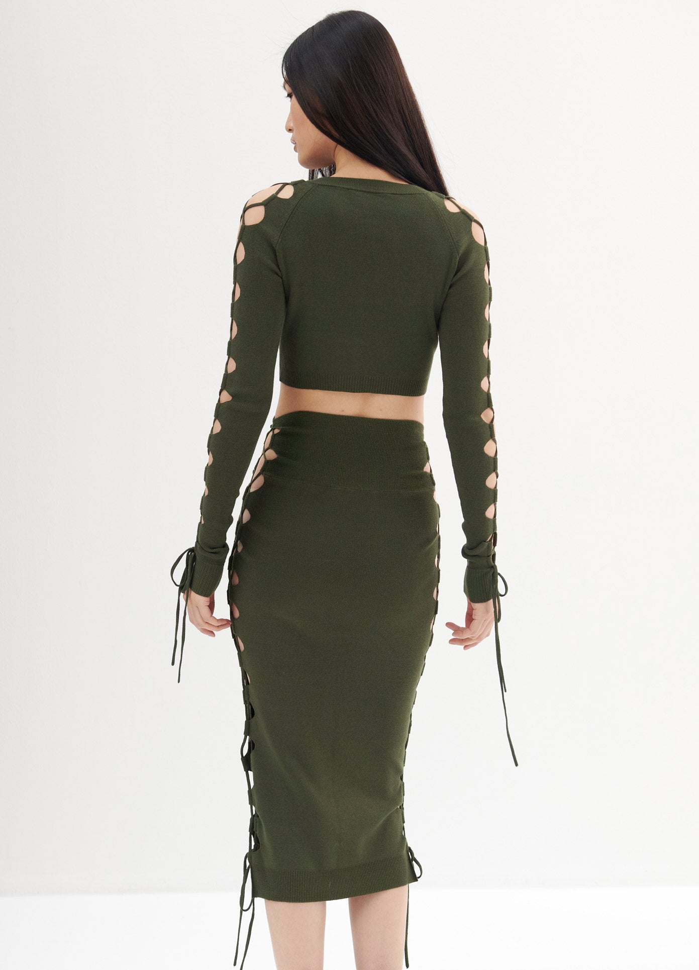 MONSE Lacing Knitted Skirt in Olive on Model Back View