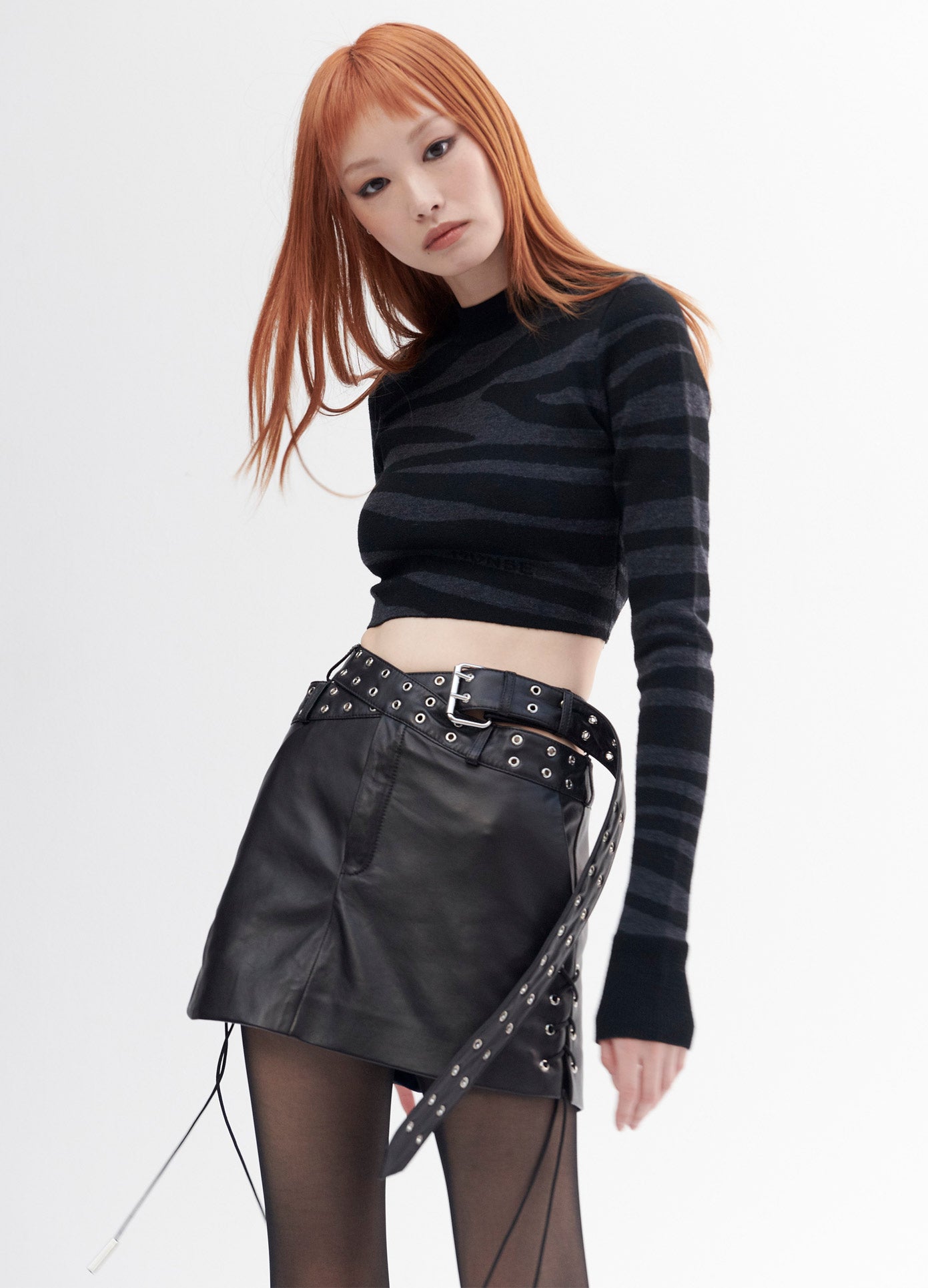 MONSE Leather Criss Cross Mini Skirt in Black on Model Front View