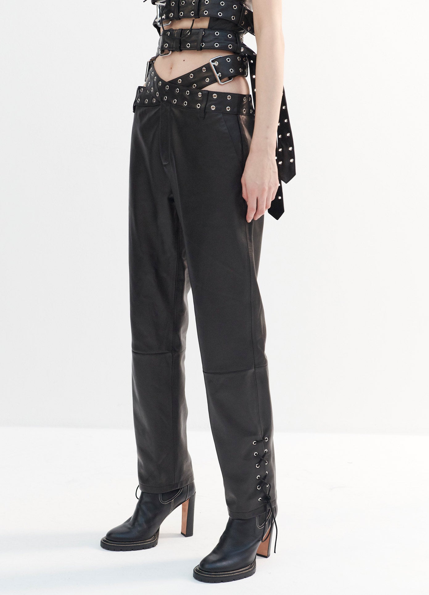 MONSE Leather Criss Cross Trousers in Black on Model Front Detail View