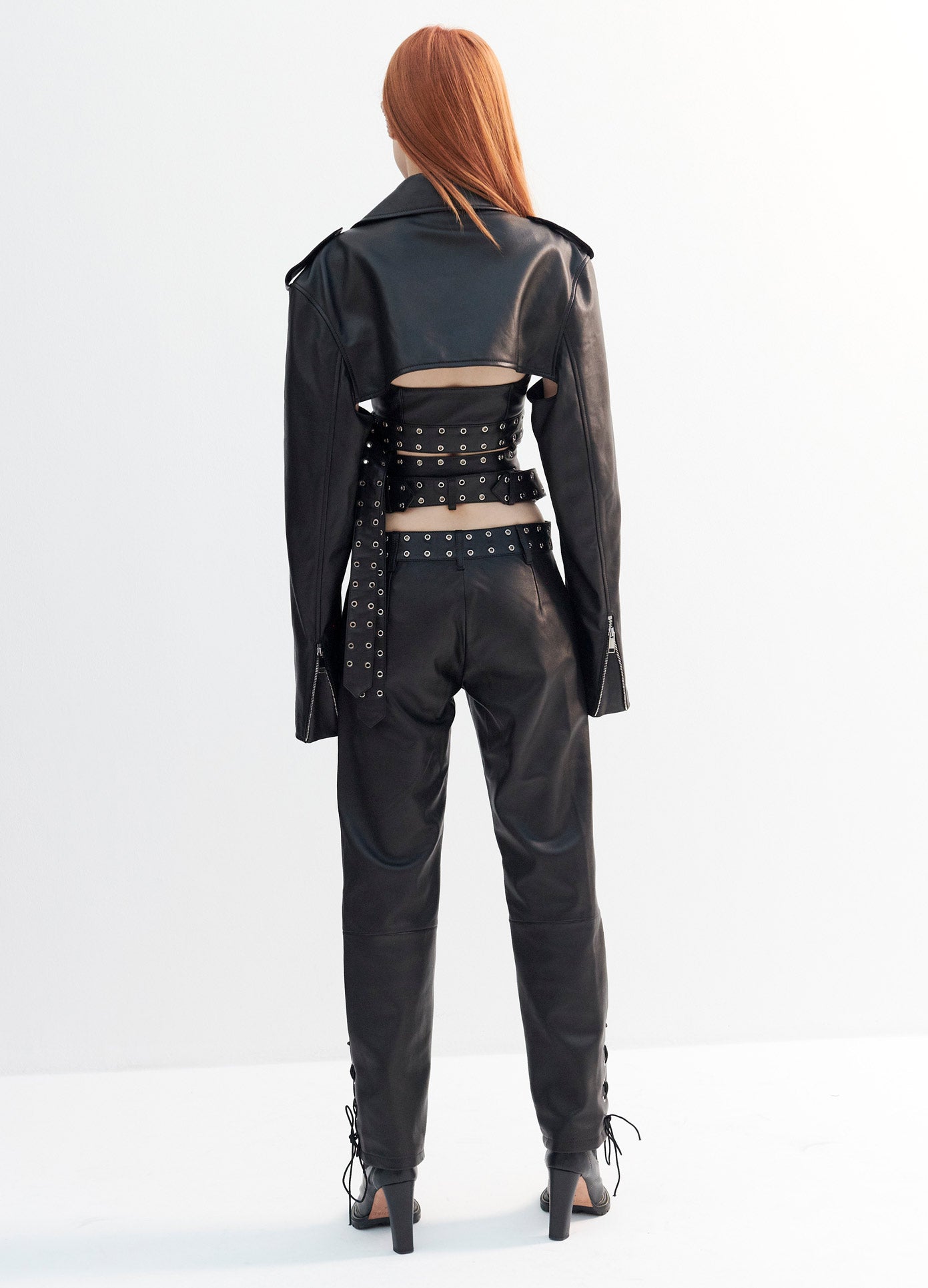 MONSE Leather Criss Cross Trousers in Black on Model Full Back View