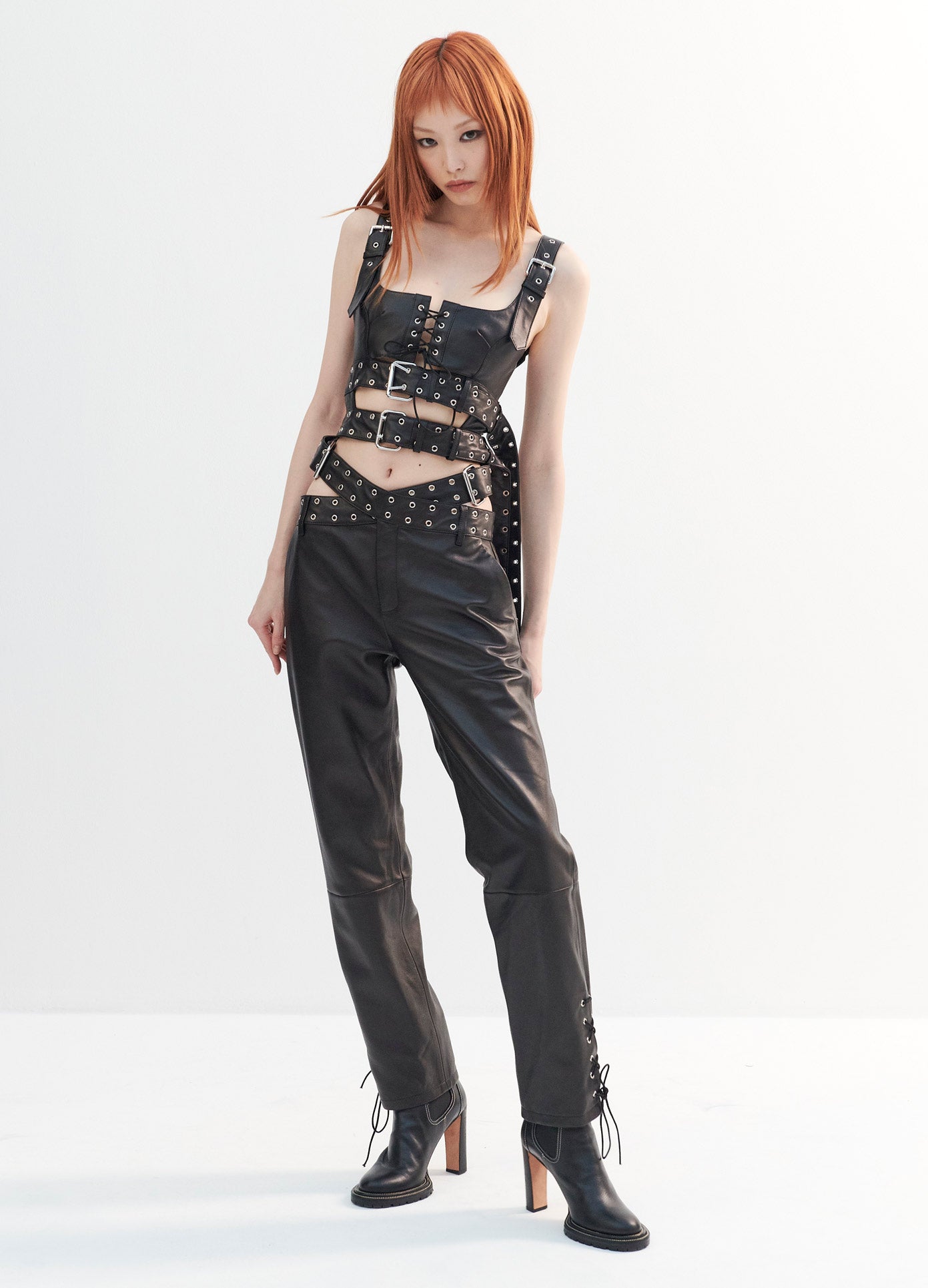 MONSE Leather Criss Cross Trousers in Black on Model Full Front View