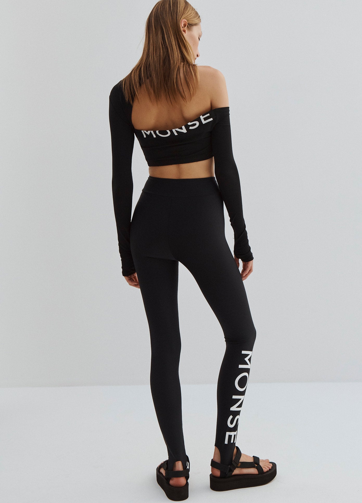 MONSE Logo Artwork Leggings in Black on Model Full Back View